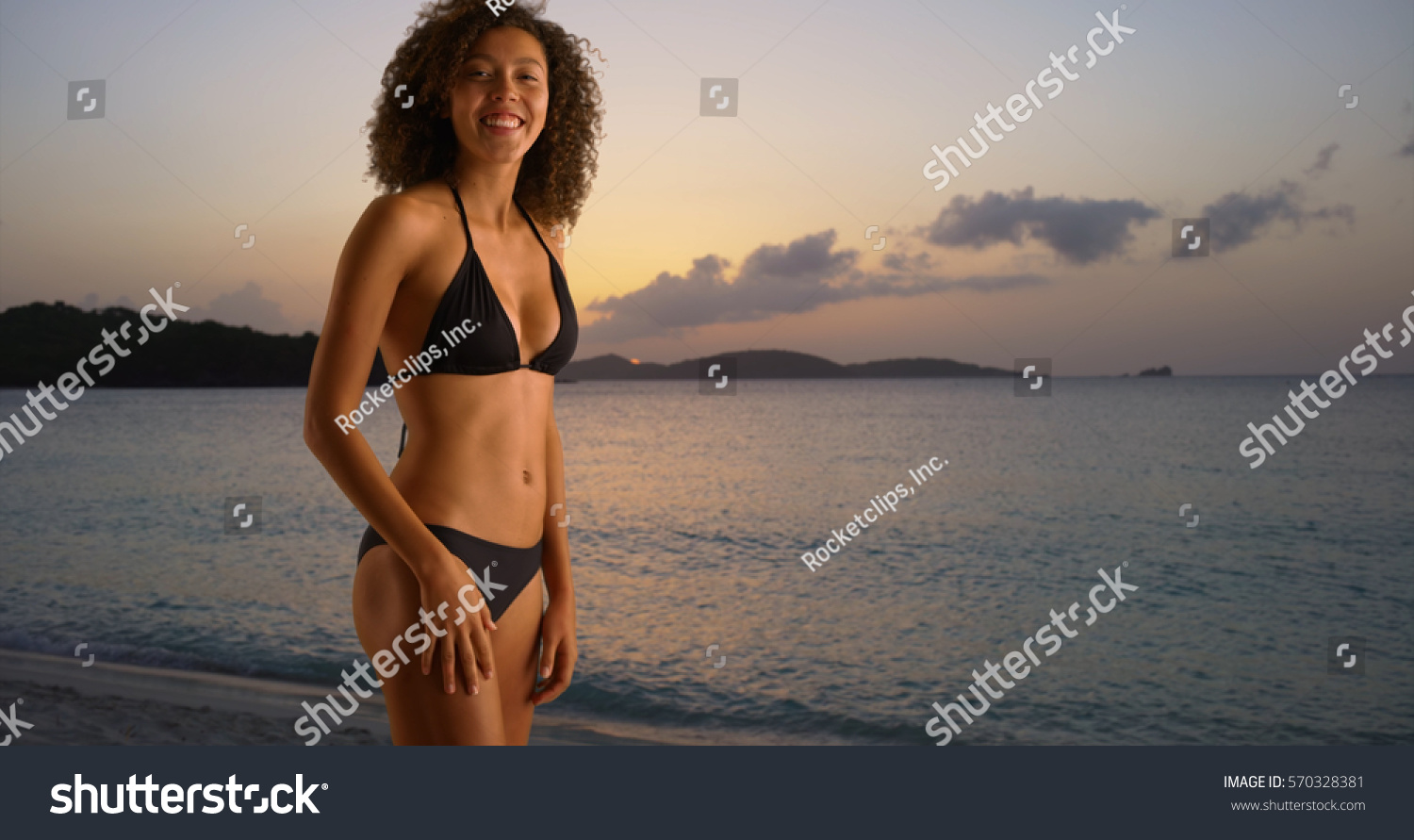 Young Black Woman Teasing Bikini On photo