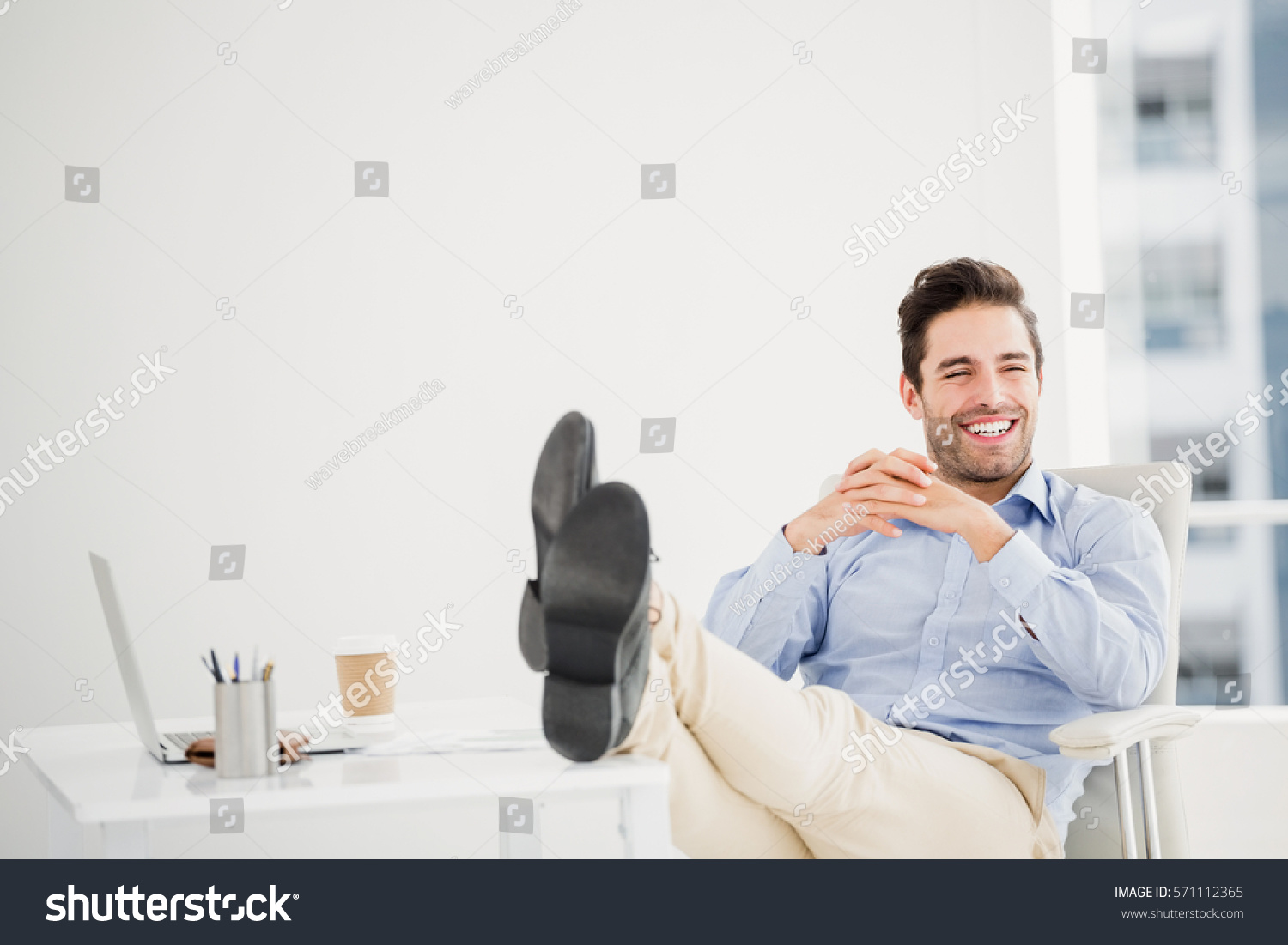 Thoughtful Man Sitting Feet On Table Stock Photo 571112365 | Shutterstock