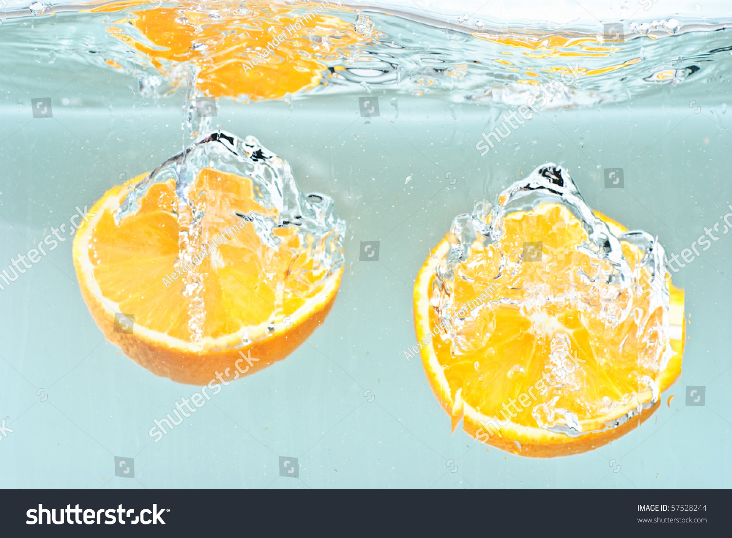 Oranges Splashing Into Water Stock Photo 57528244 | Shutterstock