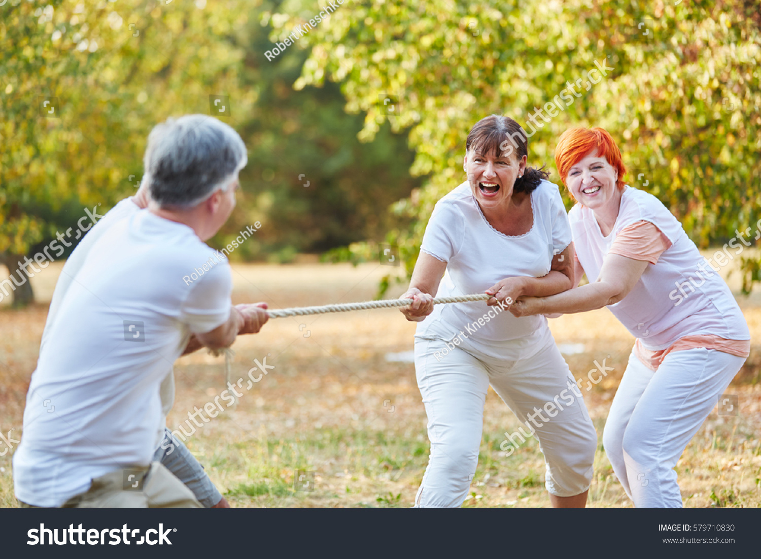 Group Senior Friends Playing Tug War Stock Photo 579710830 | Shutterstock