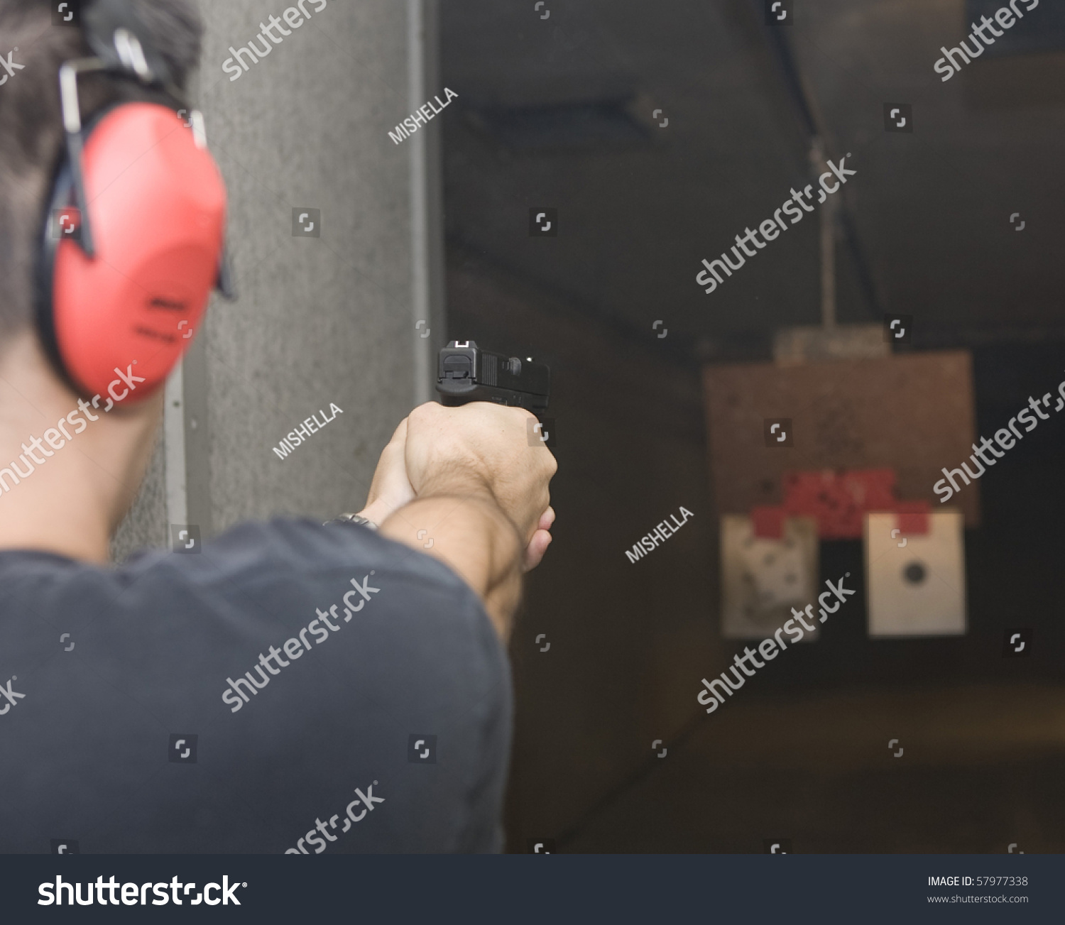 Target Practicing Gun Shooting Range Stock Photo 57977338 Shutterstock Stock Photo Target Practicing With Gun In The Shooting Range 57977338