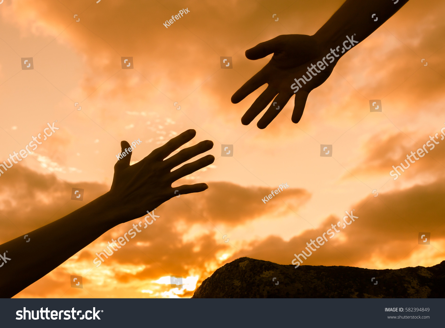 giving-helping-hand-582394849-shutterstock