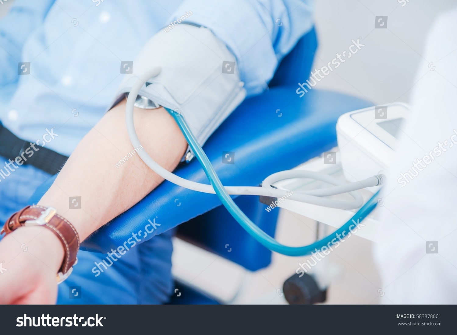 Blood Pressure Measurement Doctor Measuring Blood Stock Photo 583878061 ...