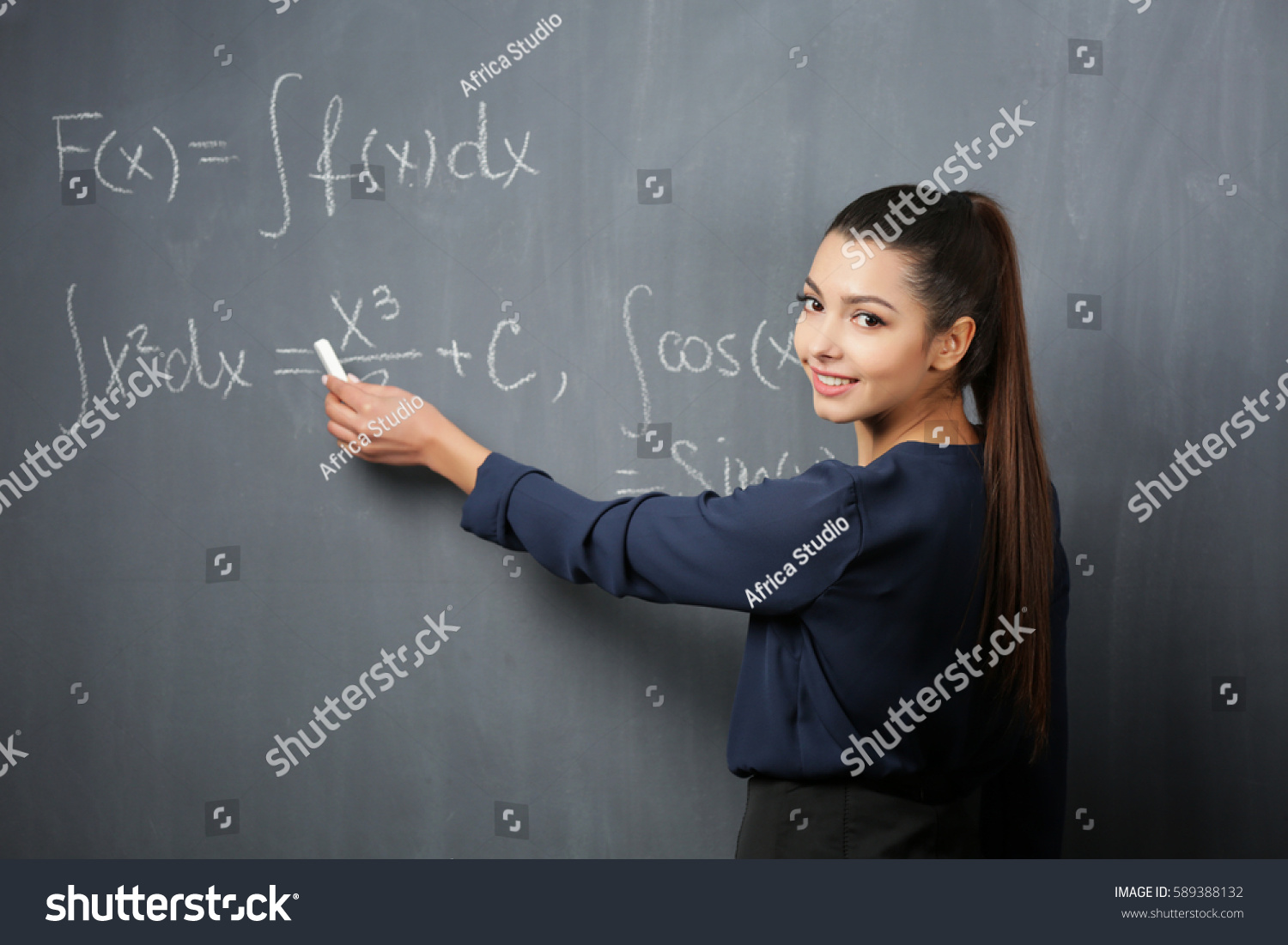 Beautiful Young Teacher Explaining Math Formulas Stock Photo 589388132 ...