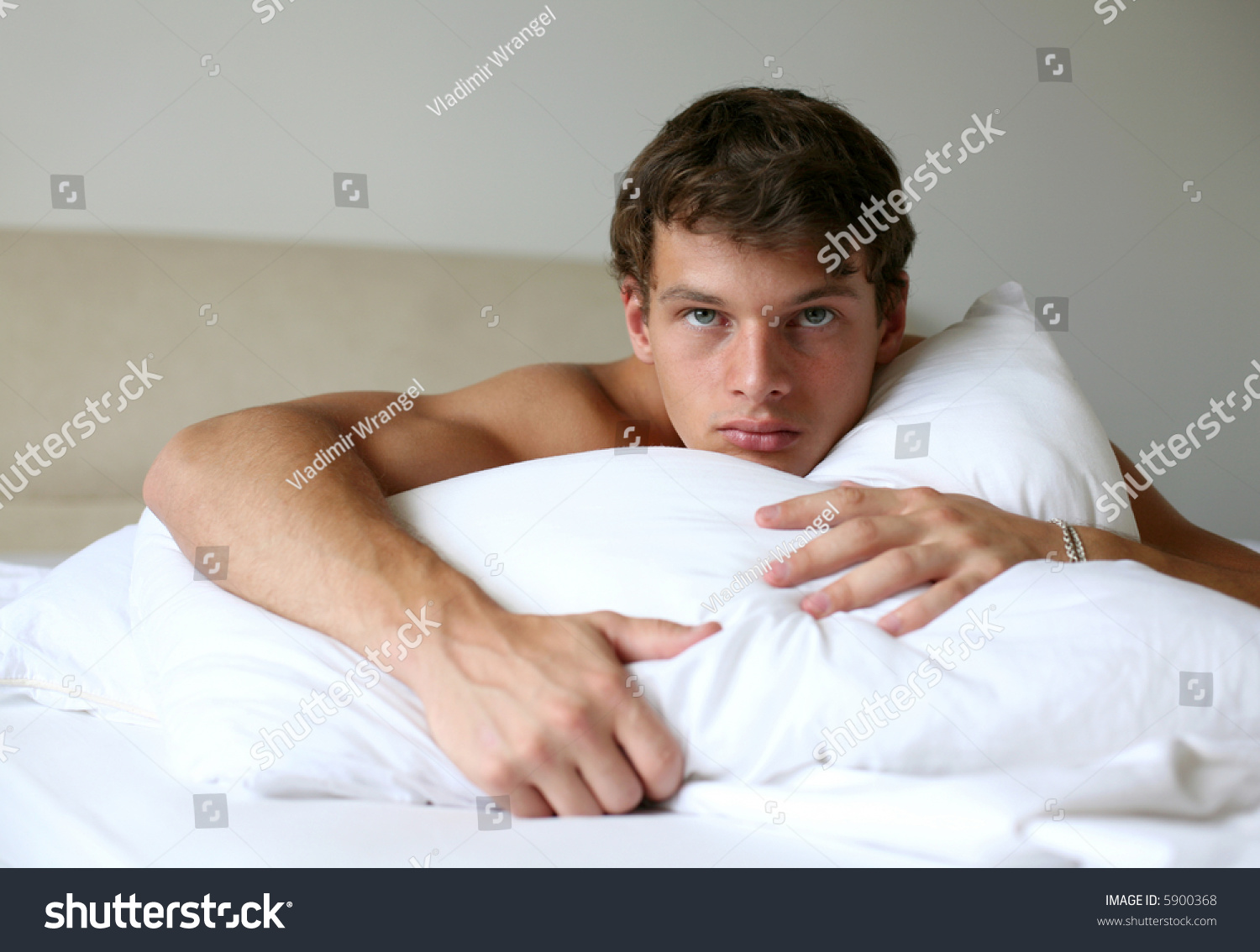 Sexy Muscular Man Lying On Bed Shutterstock