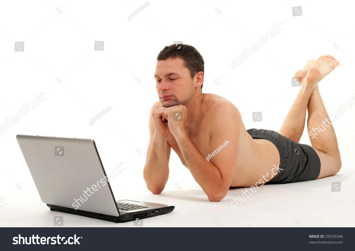 Naked Man Lying On Floor Working Stock Photo Shutterstock