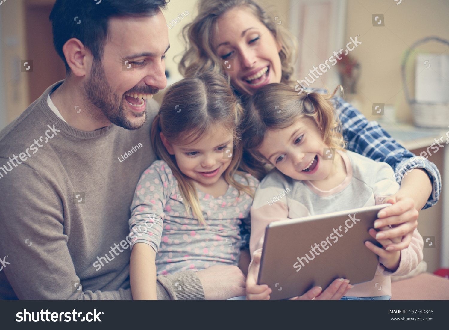 Happy Family Spending Time Home Looking Stock Photo 597240848 ...