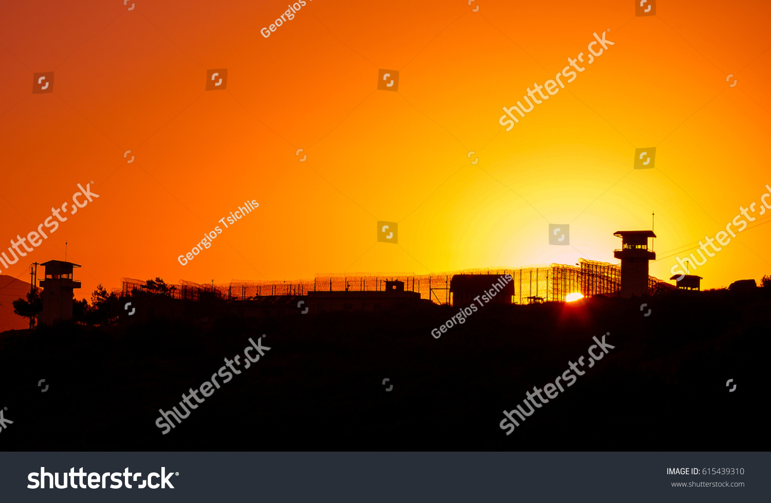 Silhouette Barbed Wires Watchtower Prison Sunset Stock Photo 615439310 ...