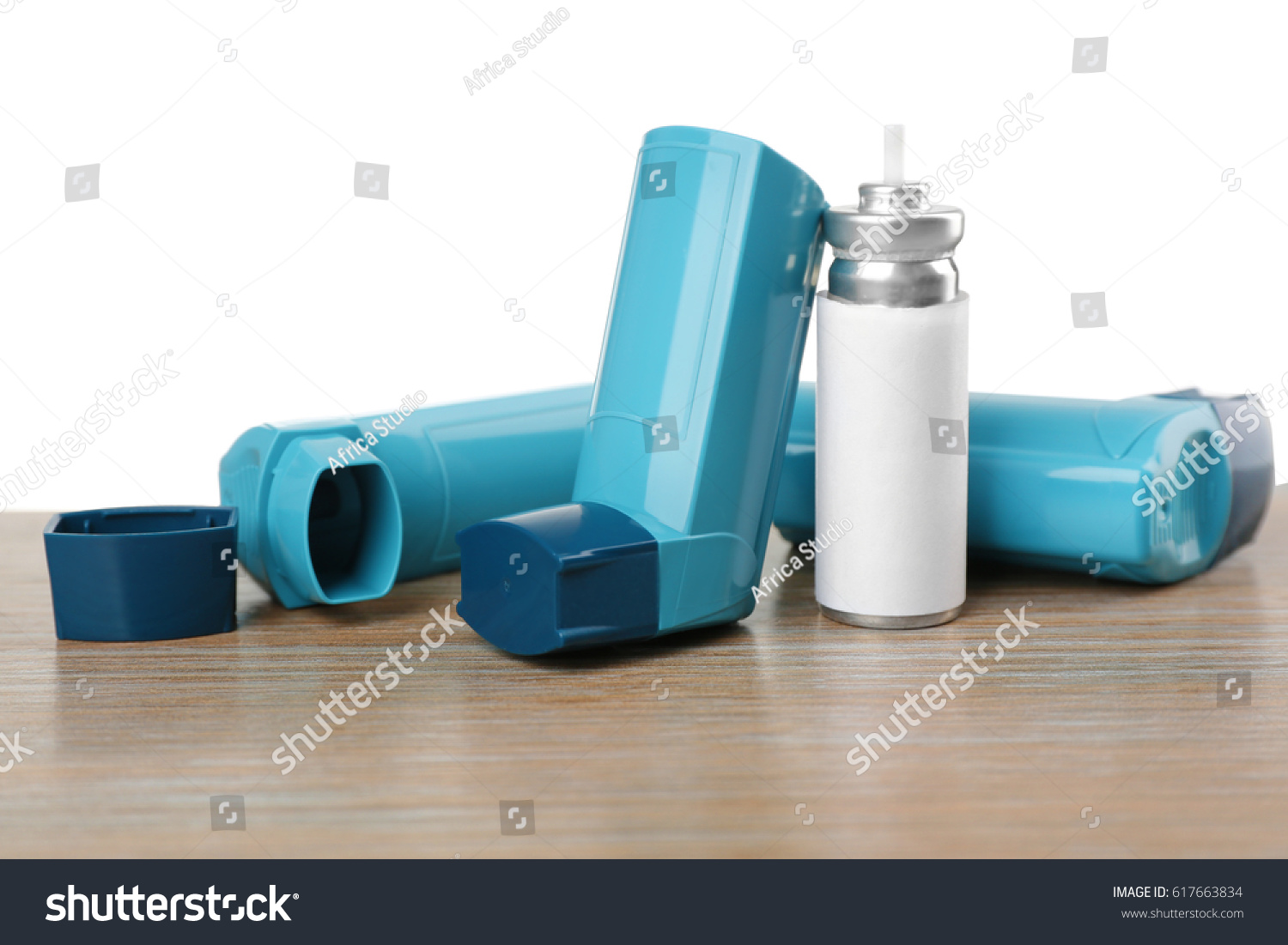 Asthma Inhalers On Wooden Table Stock Photo 617663834 | Shutterstock