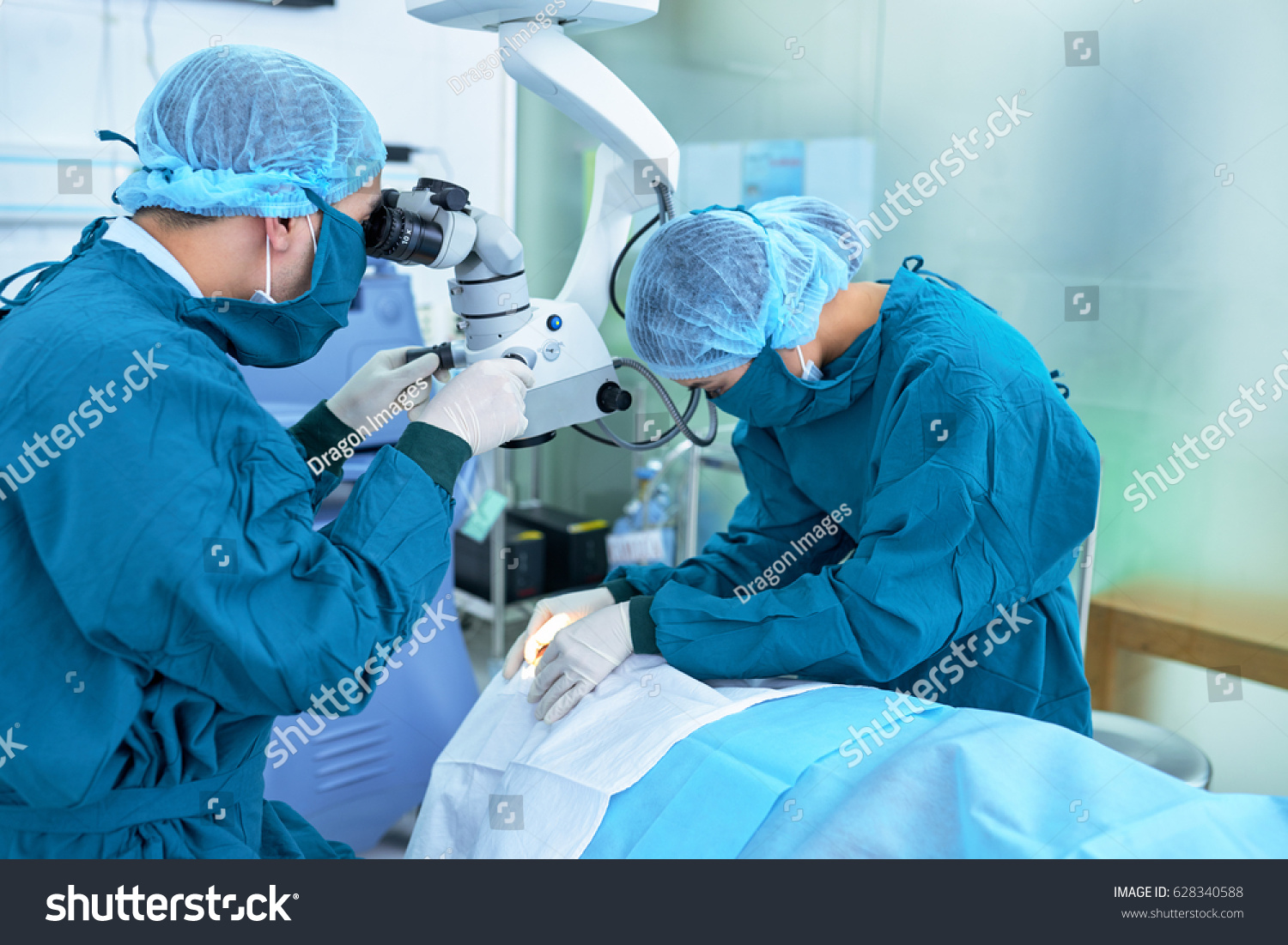 Team Medical Workers Performing Eye Surgery Stock Photo 628340588 ...