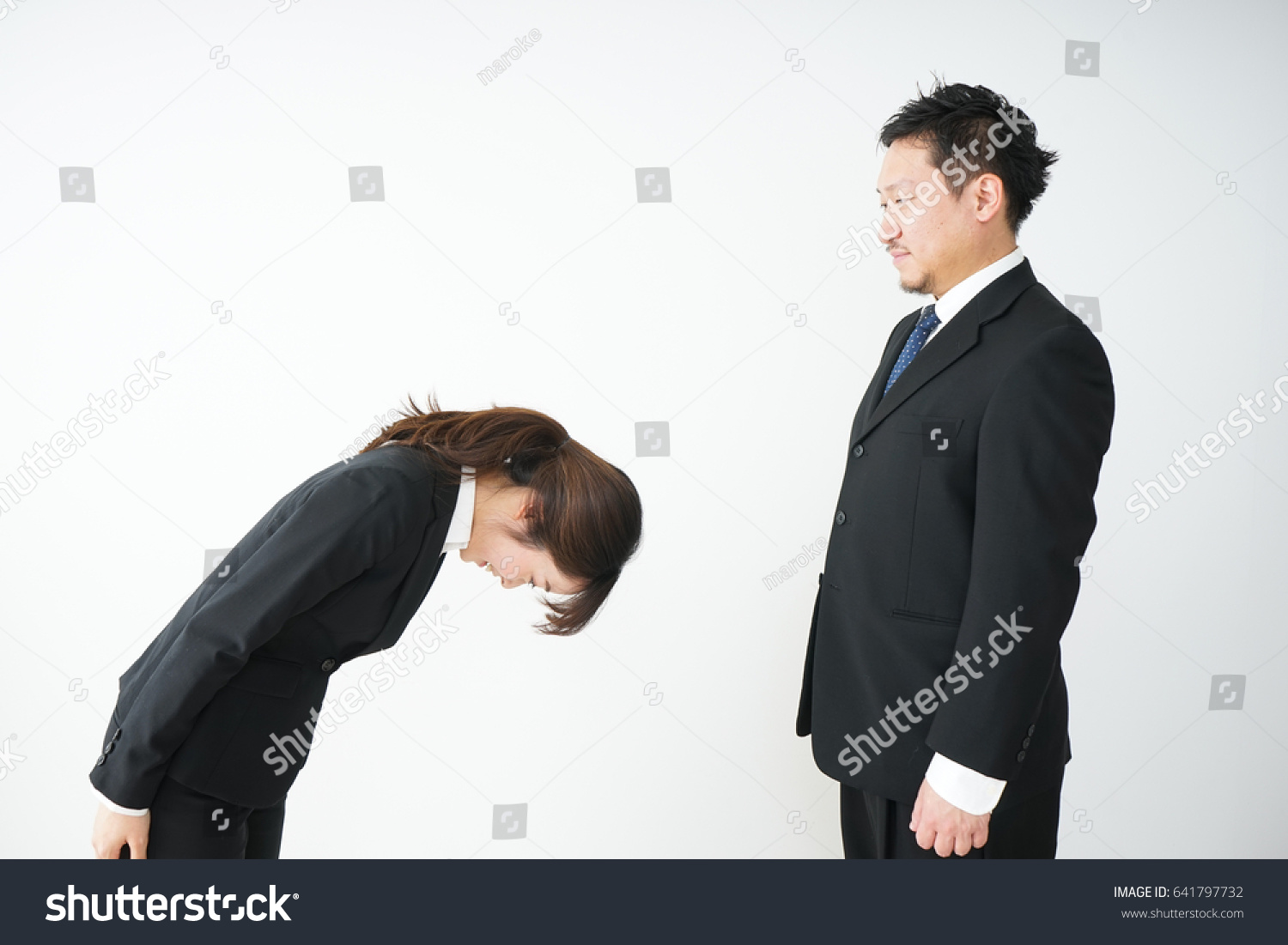 Bowing Business Person Stock Photo 641797732 | Shutterstock