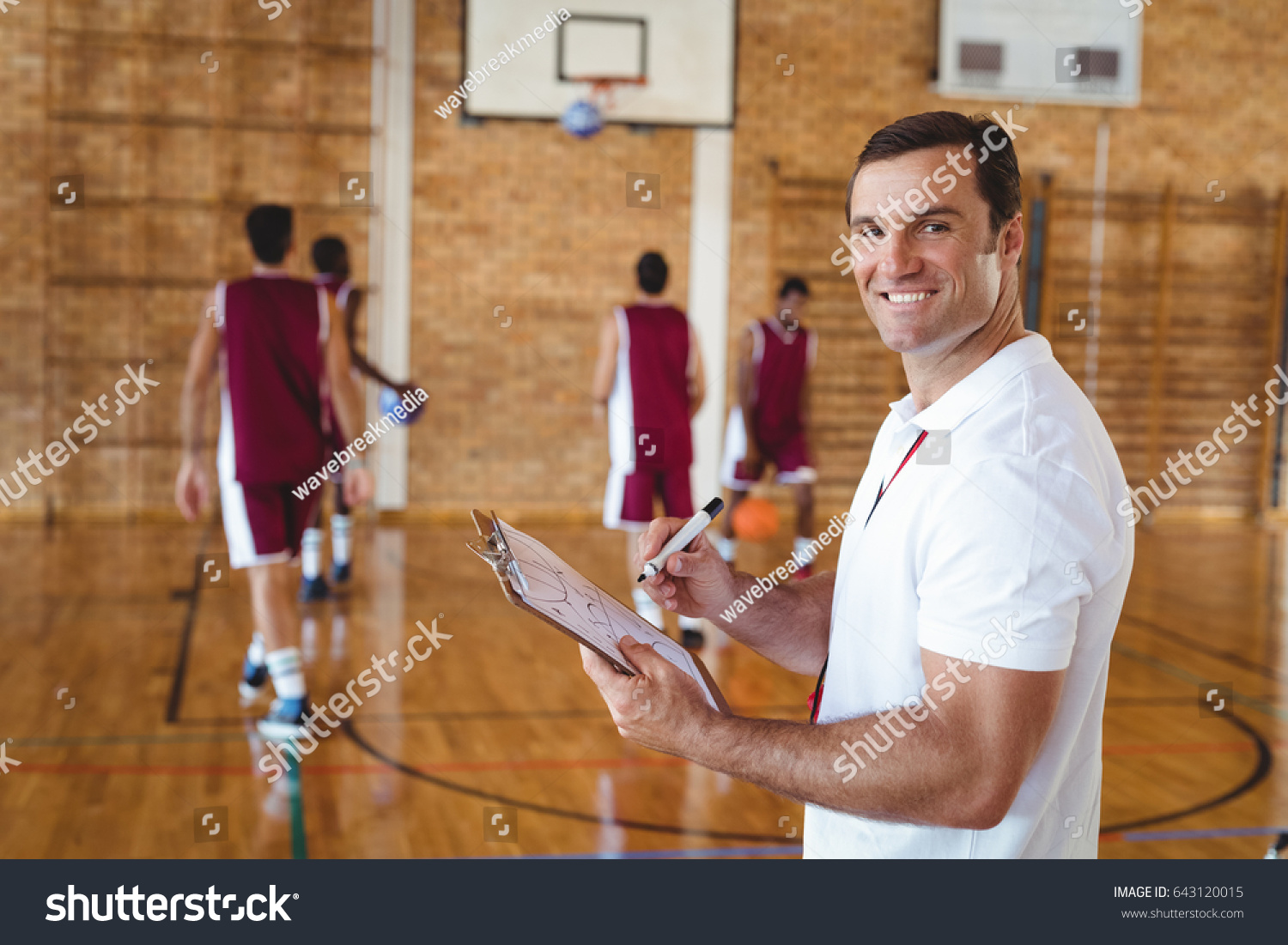 Portrait Basketball Coach Holding Clipboard Court Stock Photo 643120015 ...