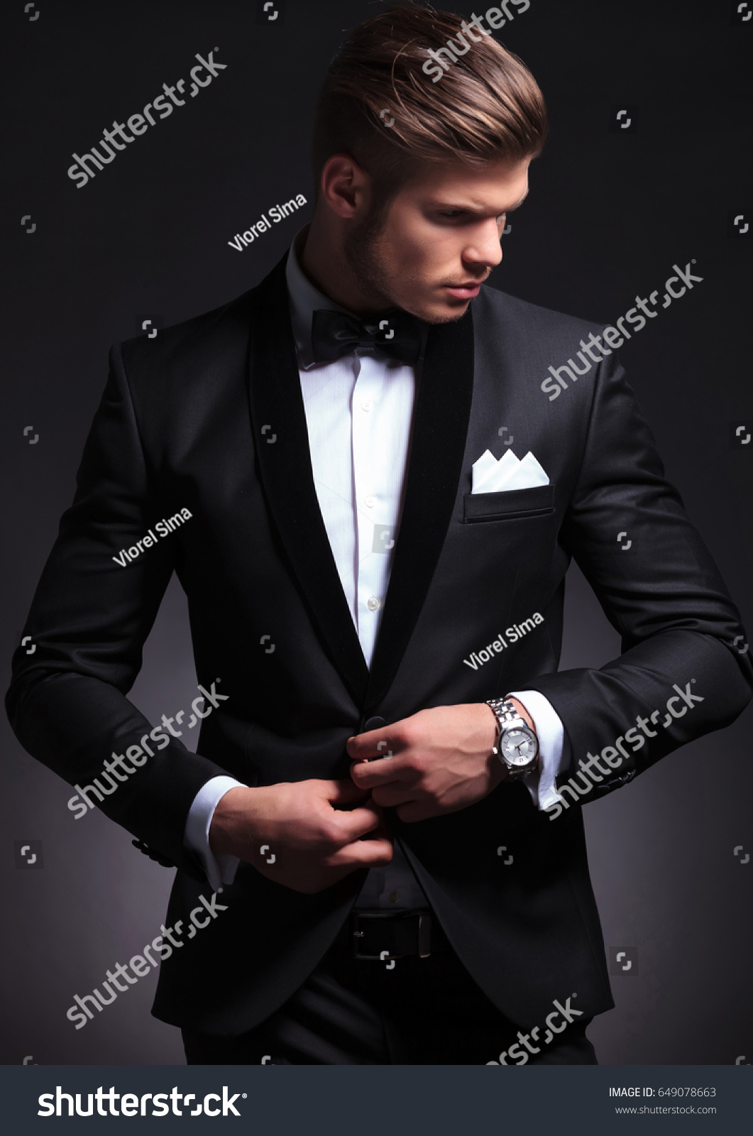 Elegant Young Fashion Man Buttoning His Stock Photo 649078663 ...