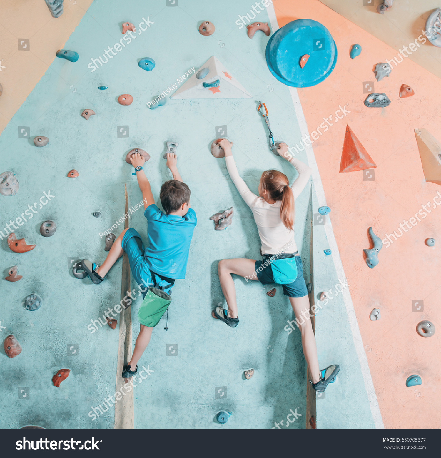 Two Children Climbing On Artificial Boulder Stock Photo 650705377 ...