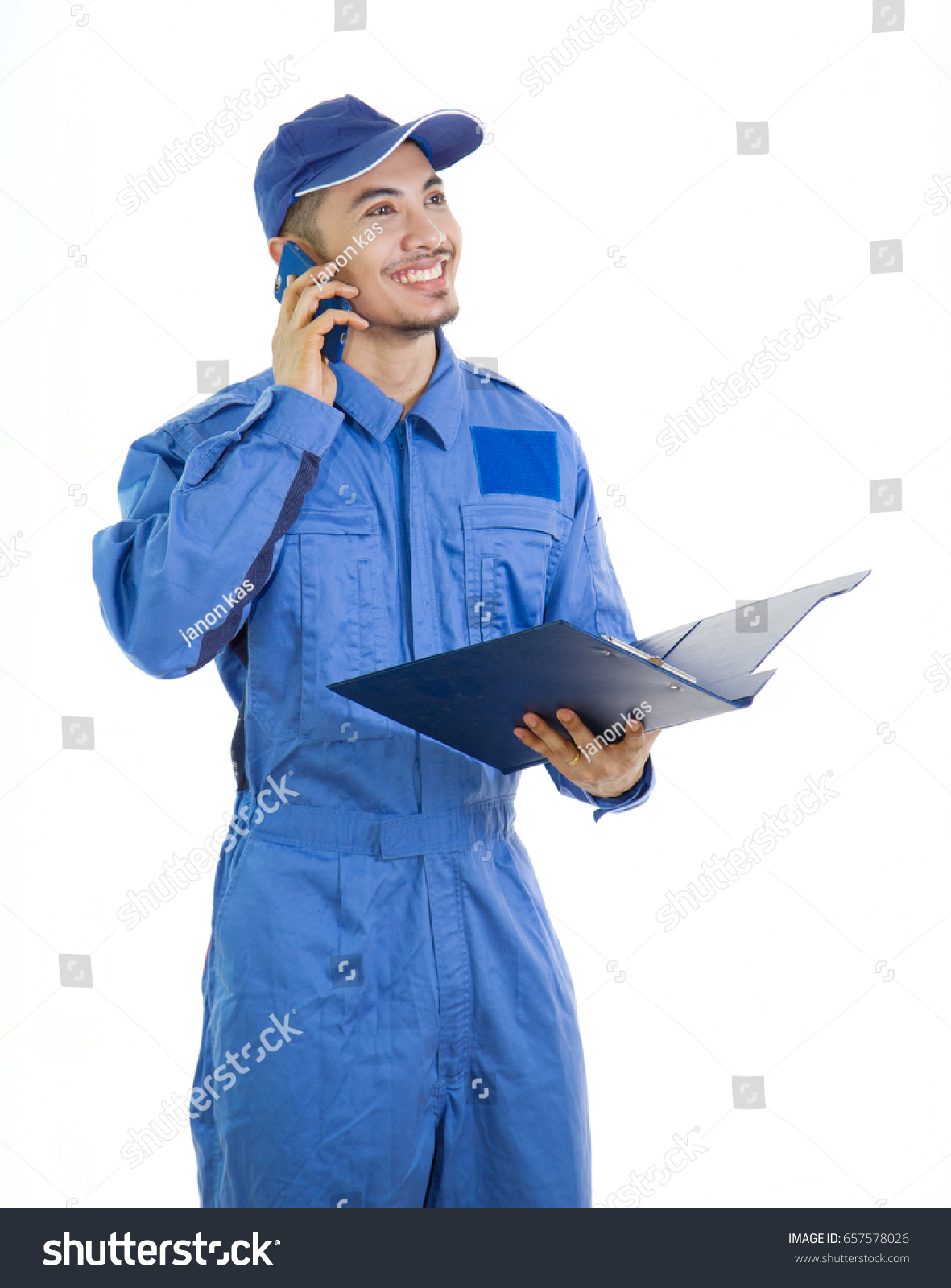 Worker Blue Overalls Working Posture Work Stock Photo 657578026 ...