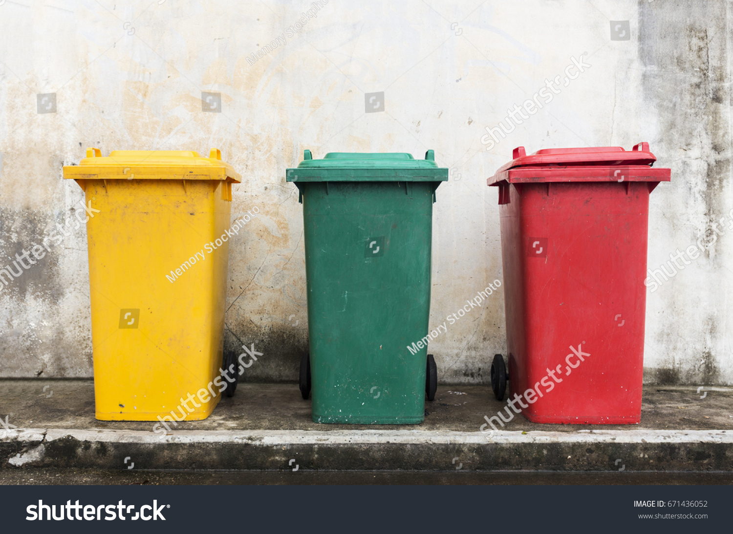 Three Colorful Bins Brick Wall Background Stock Photo 671436052