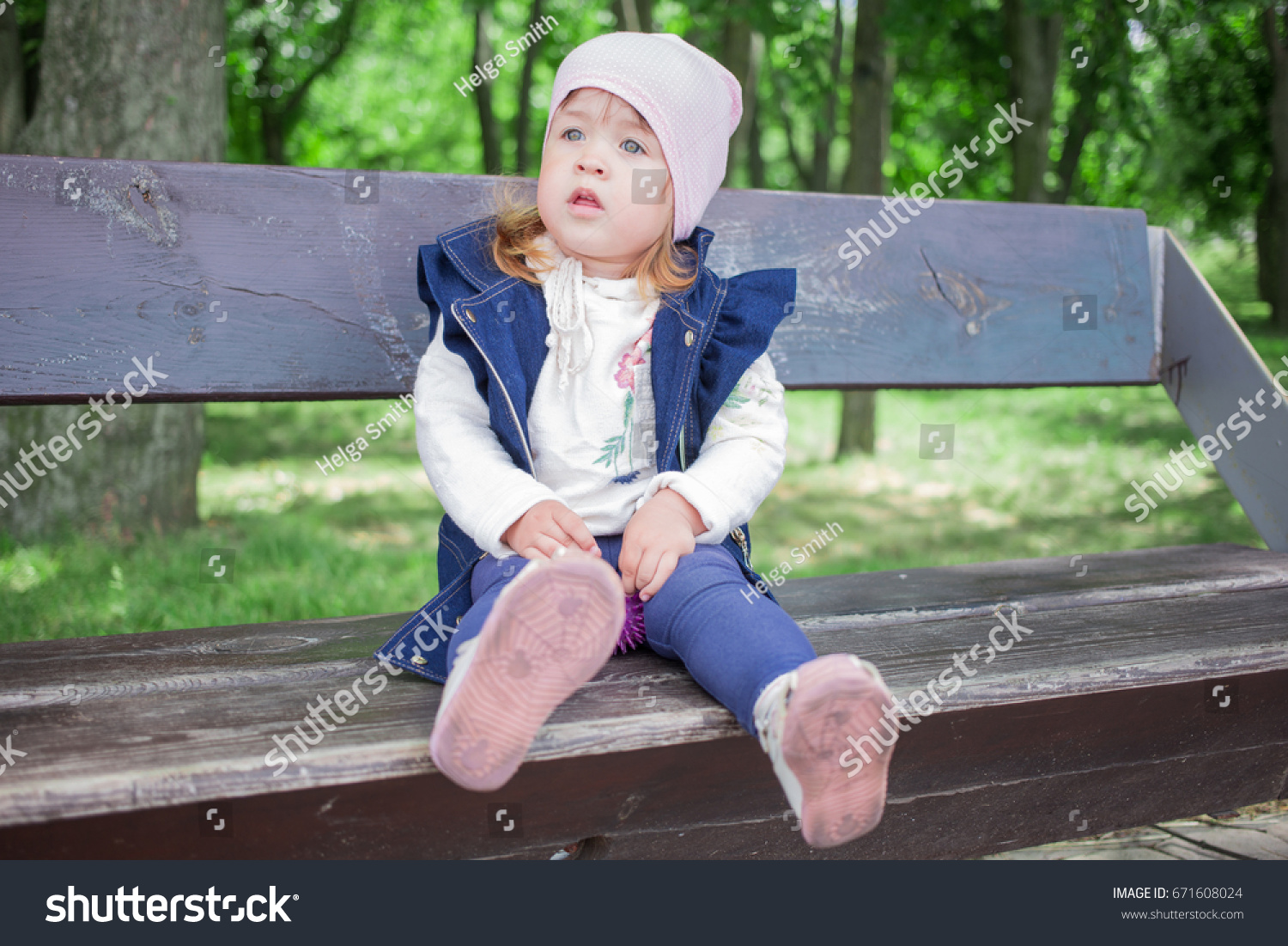 Funny Little Girl Sitting Park Stock Photo 671608024 