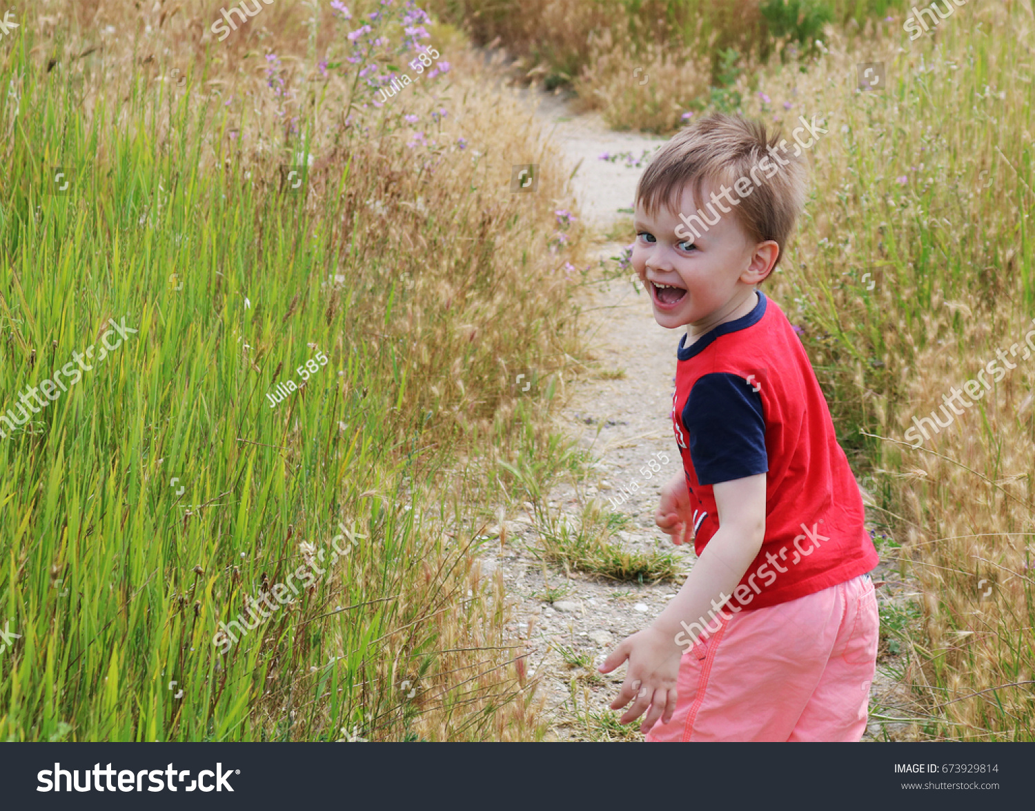 little-boy-running-away-grass-field-stock-photo-673929814-shutterstock