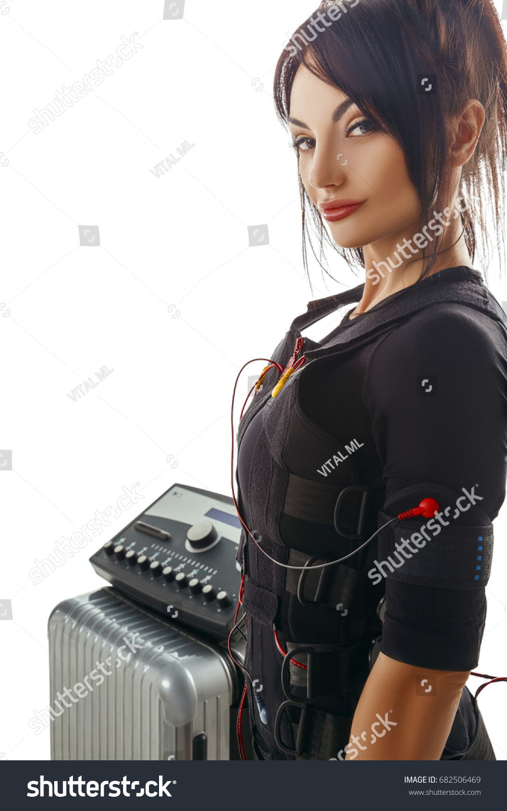 Beautiful Brunette Woman Electrical Muscular Stimulation Stock Photo