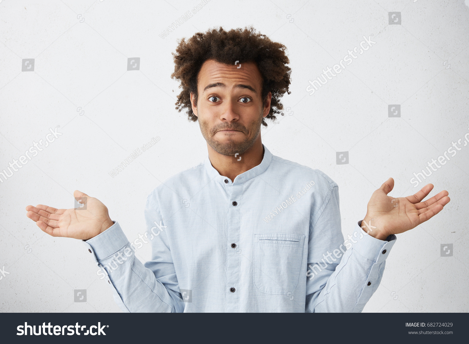 1,897 Black man shrugging shoulders Images, Stock Photos & Vectors ...