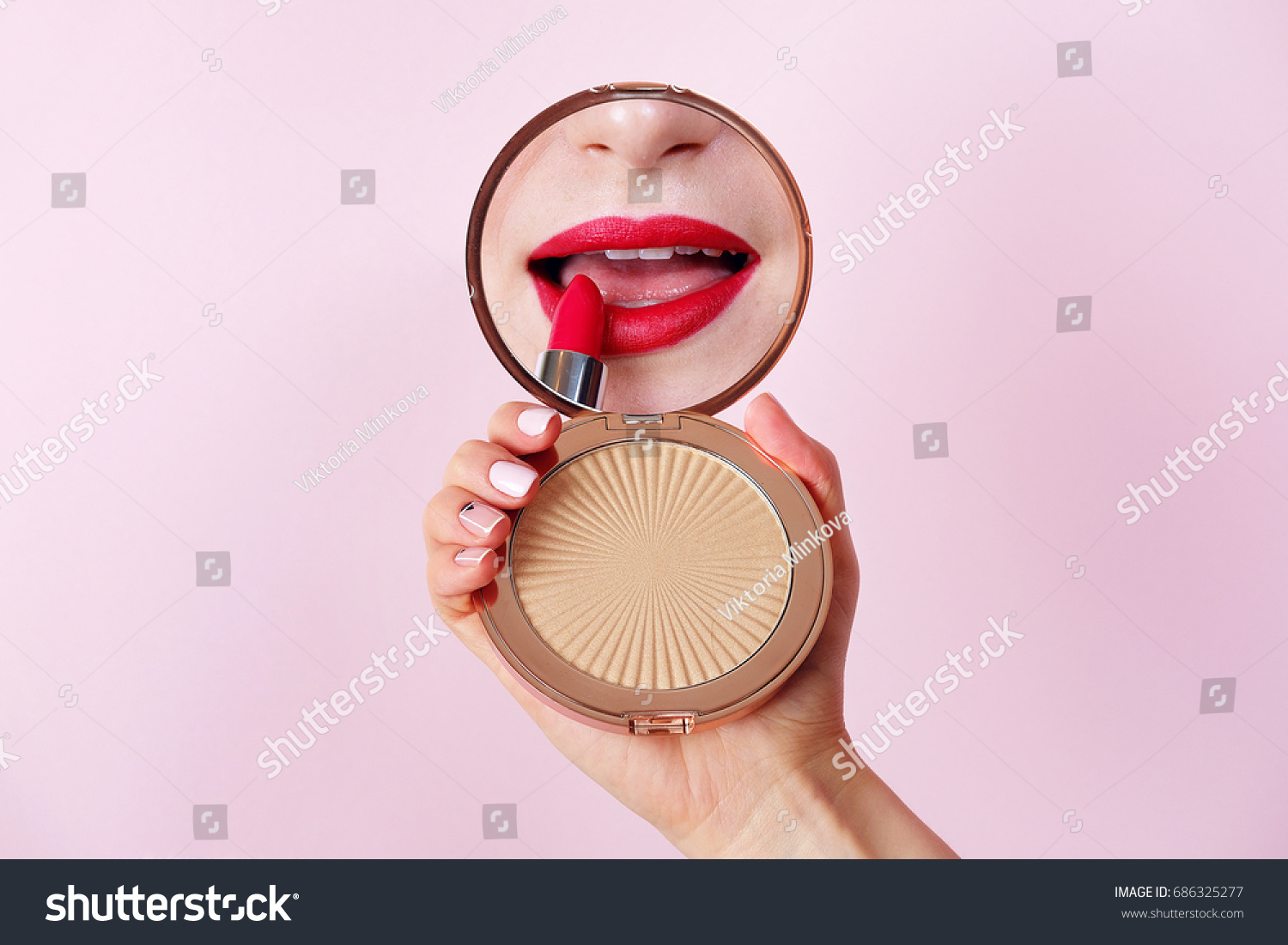 mirror with hands and lipstick