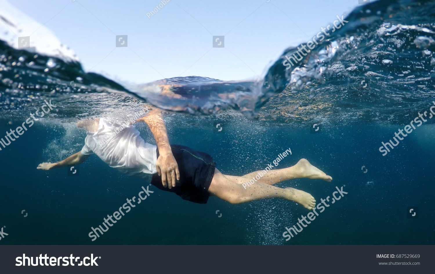 Young Man White Shirt Swimming On Stock Photo 687529669 | Shutterstock