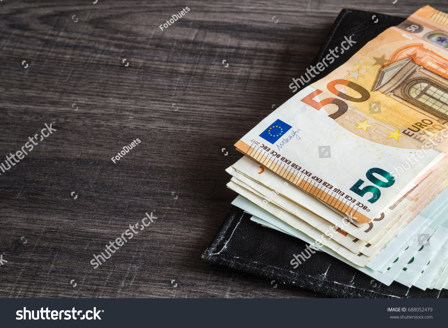 Euro Money On Wooden Table Stockfoto 688052479 Shutterstock euro-money-on-wooden-table-stockfoto-688052479-shutterstock