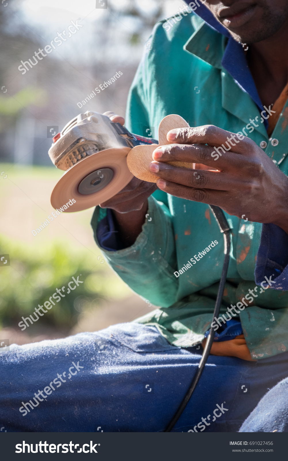 black-african-male-south-africa-carves-stock-photo-691027456-shutterstock