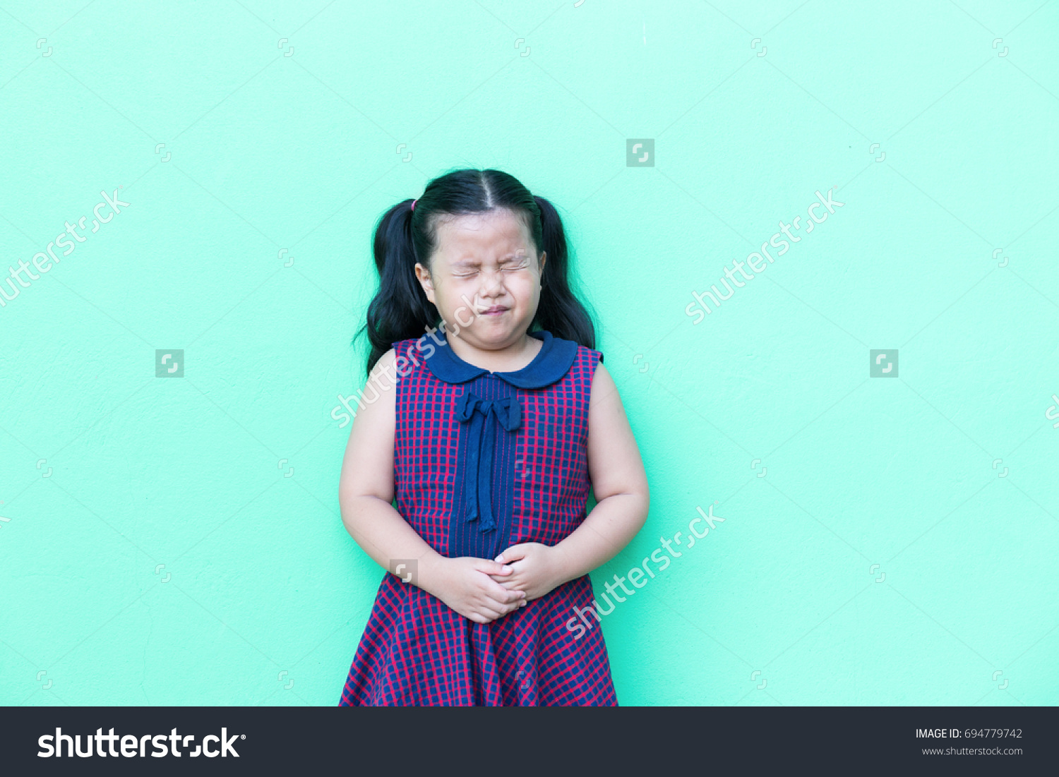 little-girl-her-has-stomachache-stock-photo-694779742-shutterstock