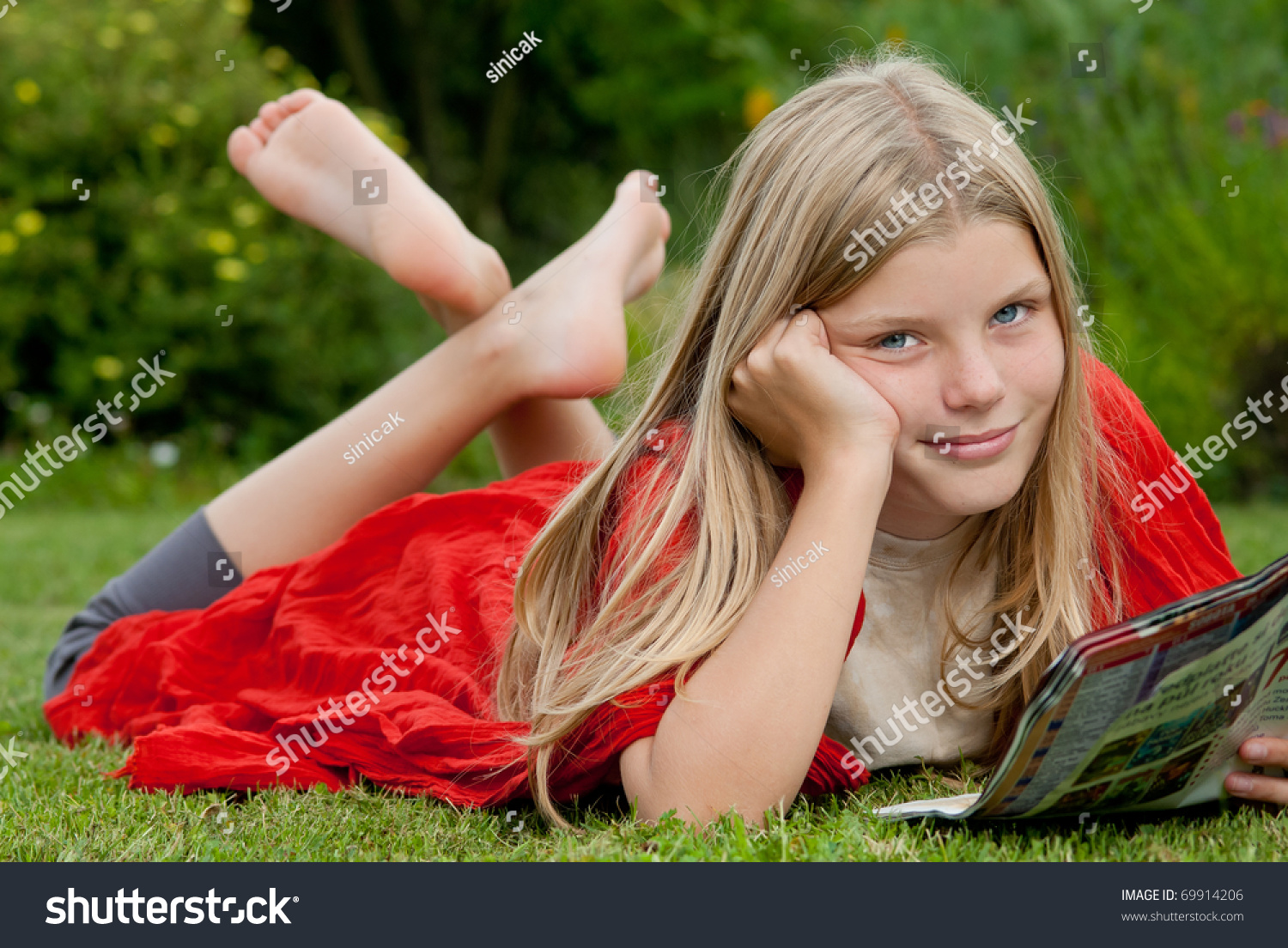 https://image.shutterstock.com/shutterstock/photos/69914206/display_1500/stock-photo-young-blond-blue-eyed-teenage-girl-lying-on-the-grass-on-the-garden-and-reading-a-teen-magazine-69914206.jpg