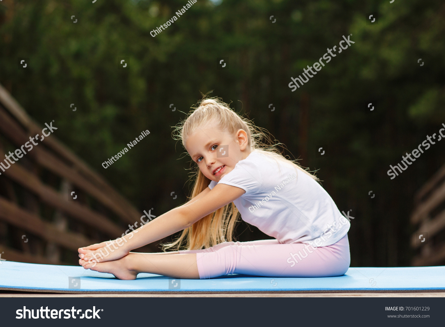 Little Girl Doing Fitness Outdoor Stock Photo 701601229 | Shutterstock