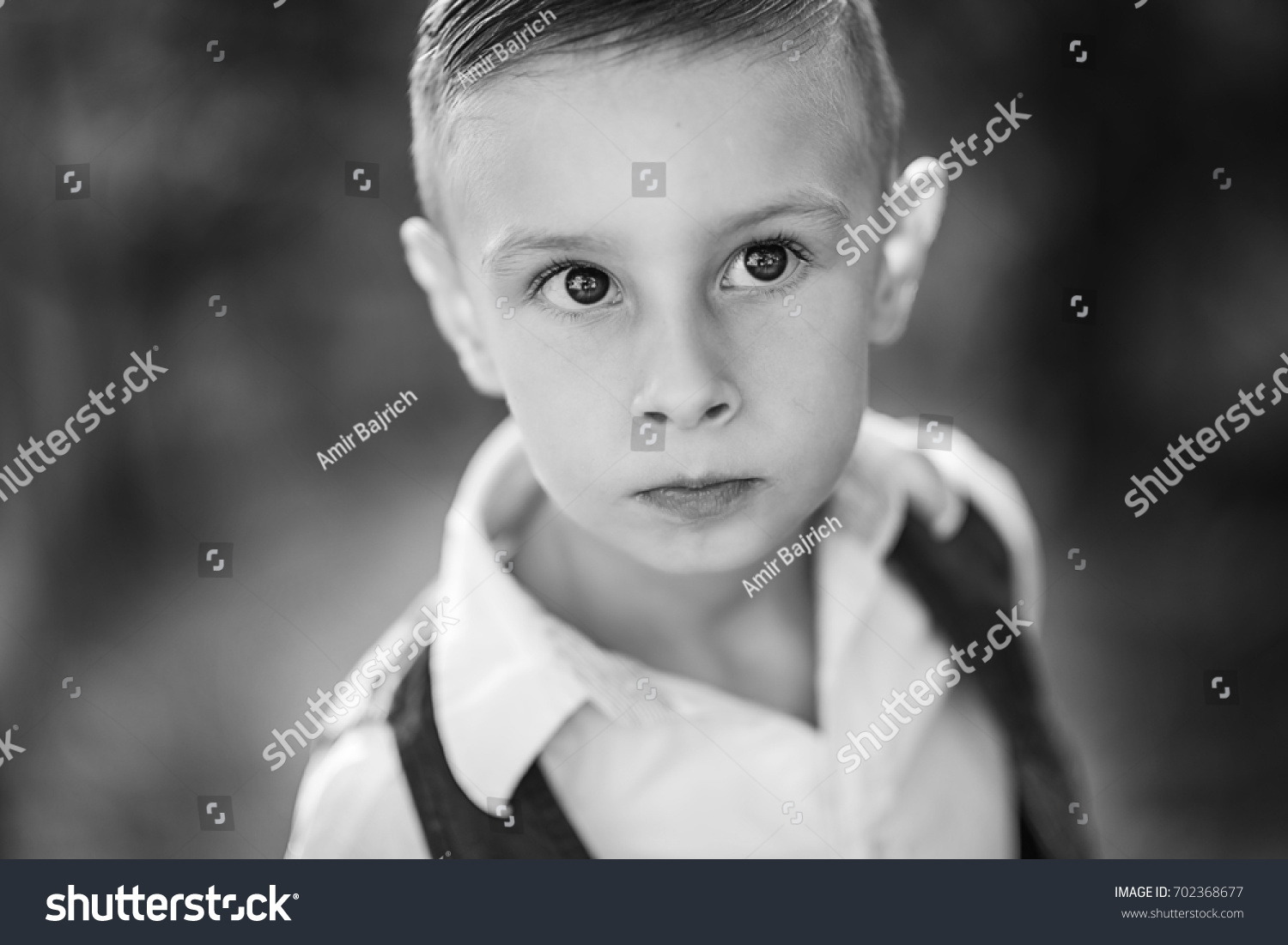 portrait-handsome-boy-stock-photo-702368677-shutterstock