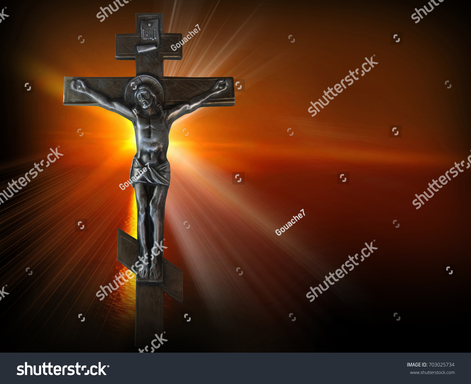 silhouette-crucified-jesus-christ-on-cross-stock-photo-703025734