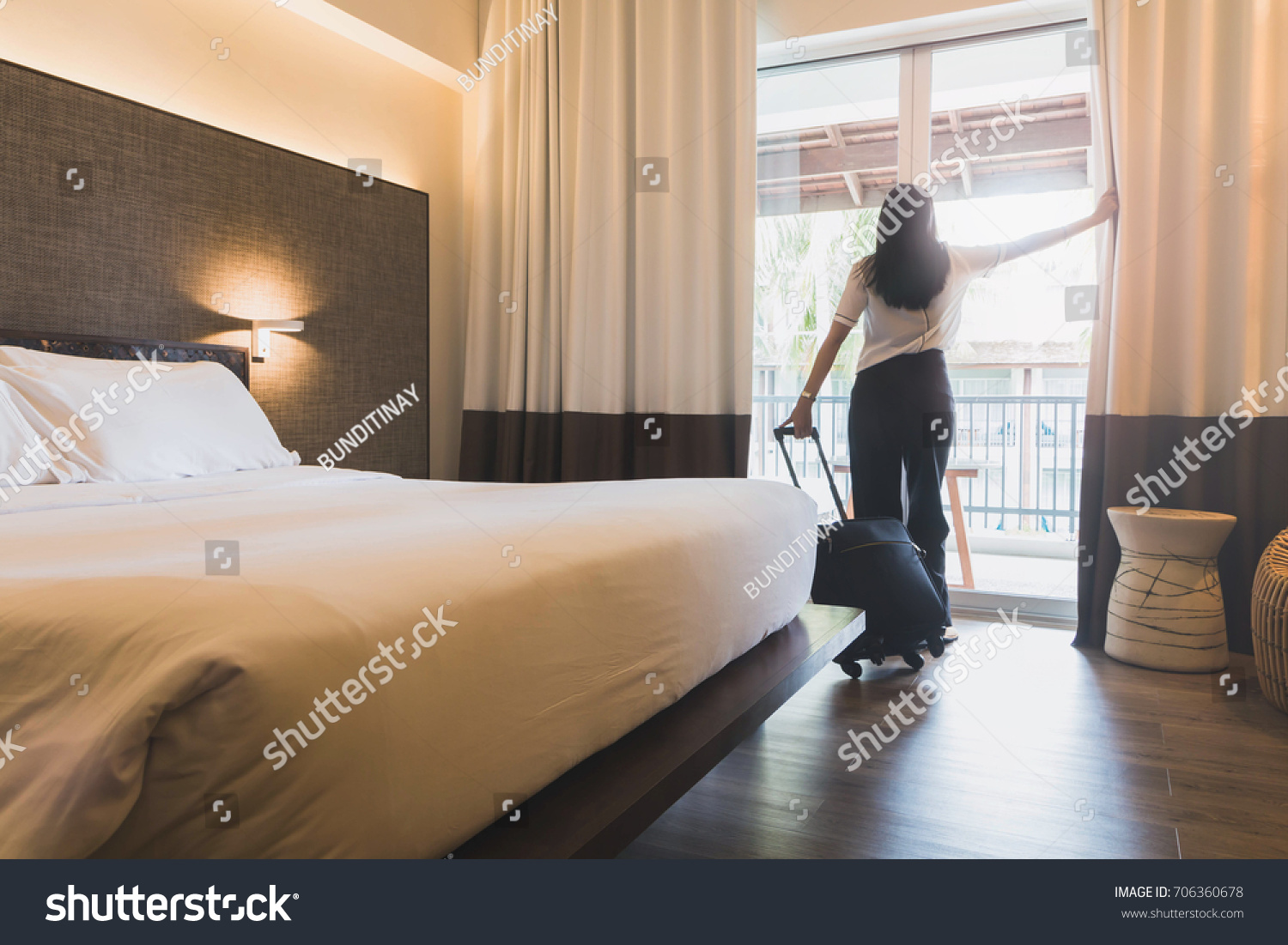 Asian Women Staying Hotel Room Open