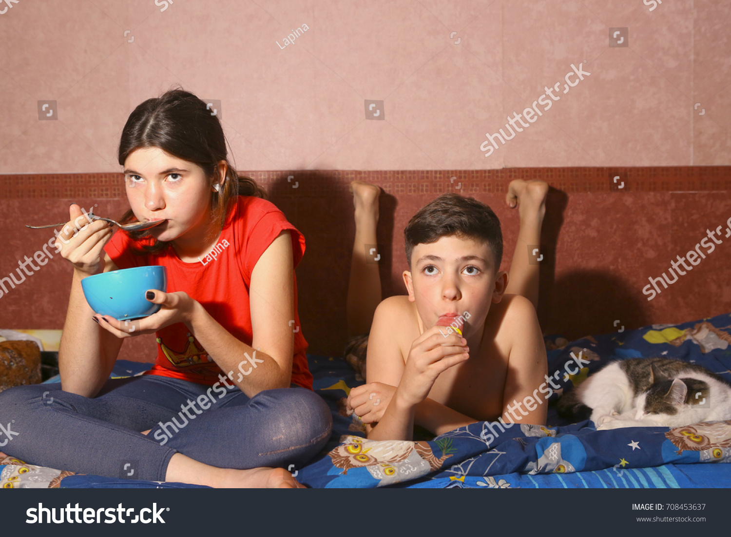 Teenager siblings brother sister lay on stock photo 708453637 shutterstock 