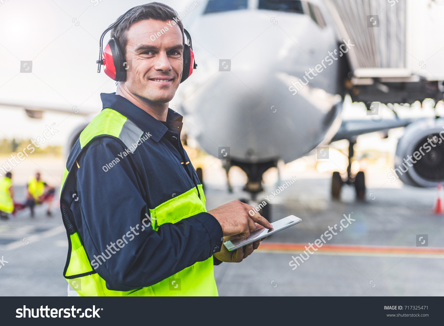 31-311-airport-workers-shutterstock