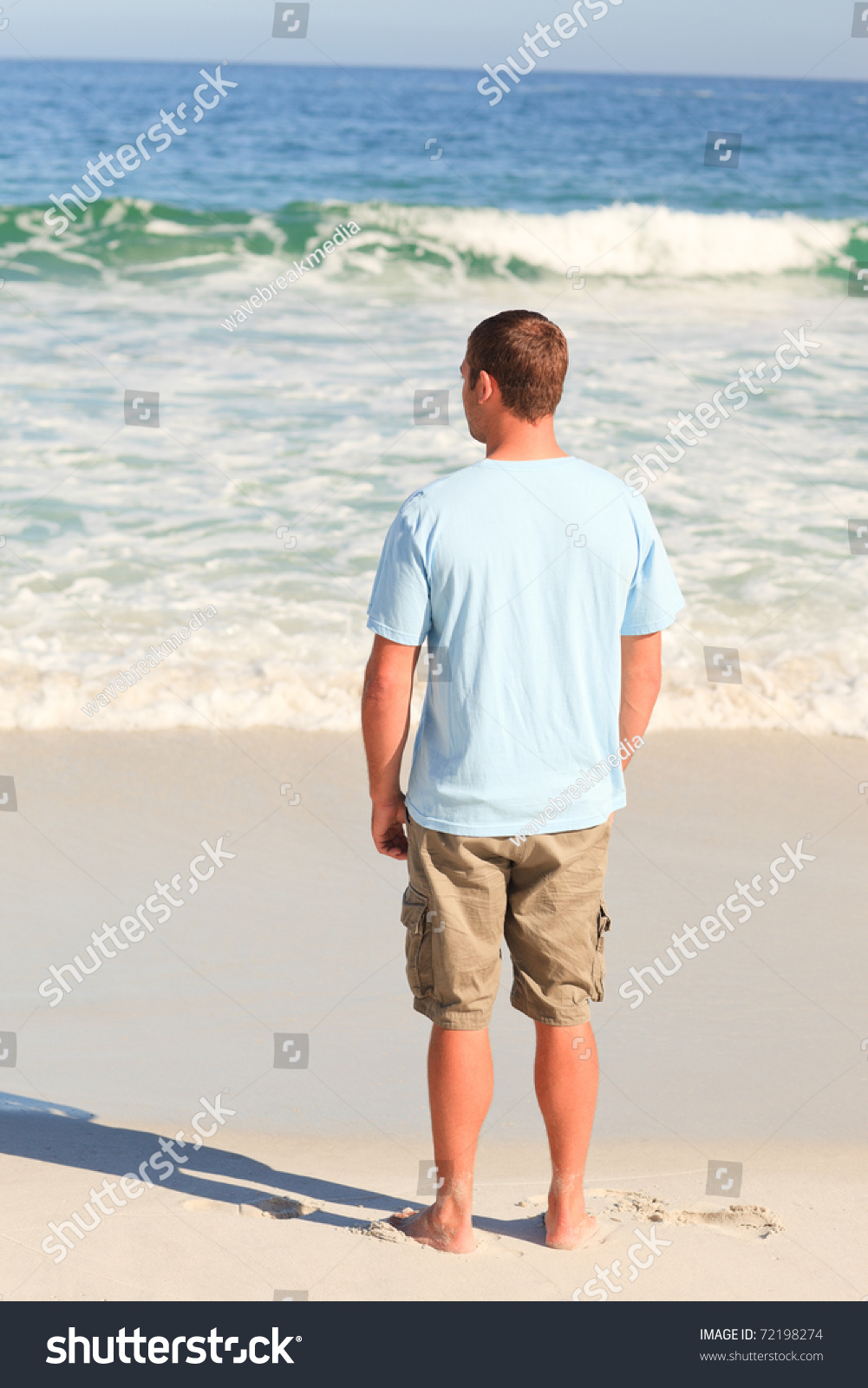 Handsome Man Walking On Beach Stock Photo 72198274 | Shutterstock