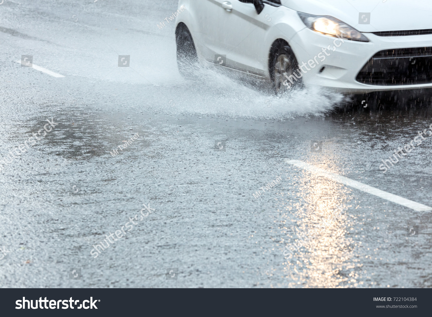 Car Driving Through Puddles Rainwater Spraying Stock Photo 722104384 ...