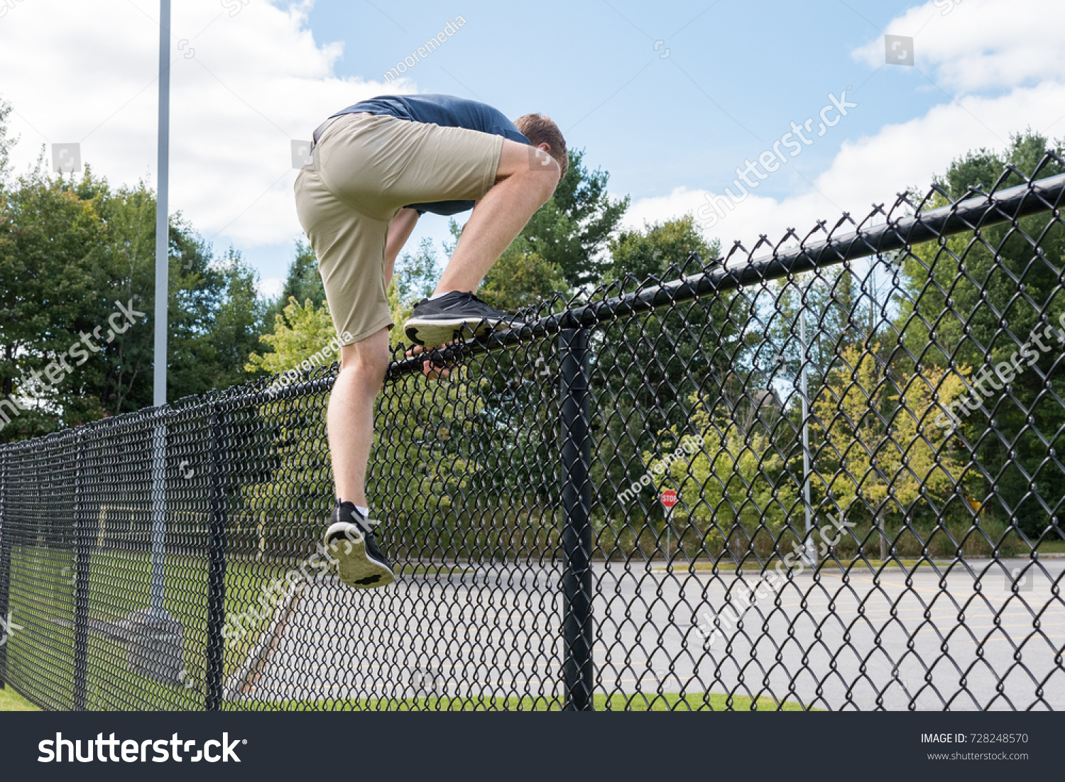 Managed to escape. Climbing the Fence. Jump over the Fence. Мальчик висит на заборе картинка. Puerto Rican Fence Climbers.