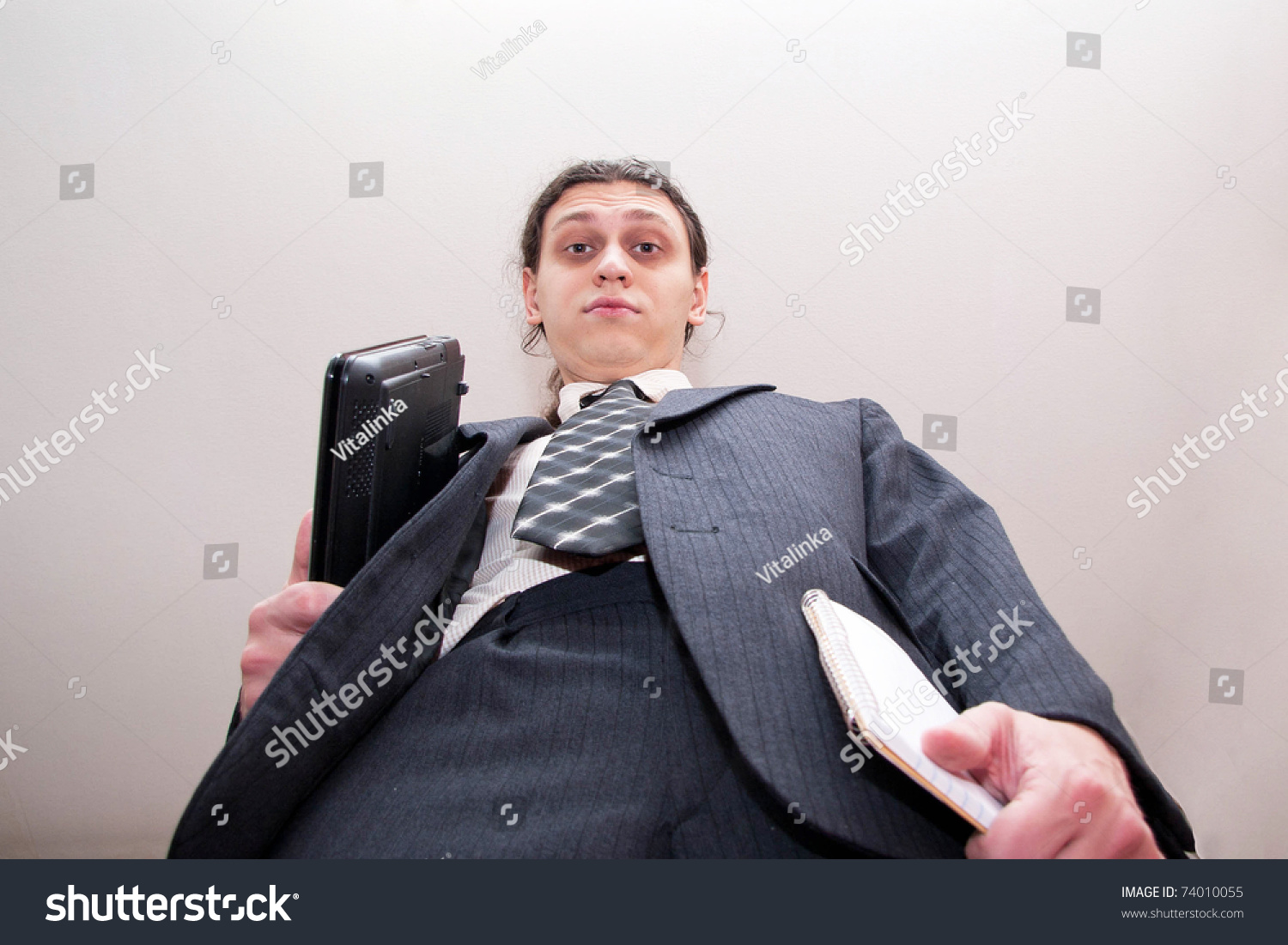 stock-photo-angry-big-boss-is-looking-down-at-camera-ready-for-your-symbols-or-logo-74010055.jpg
