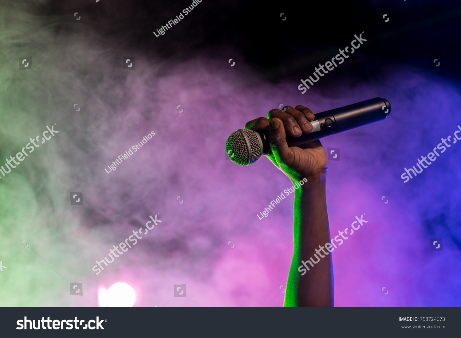 Cropped View Hand Holding Microphone Nightclub Stock Photo 758724673 ...