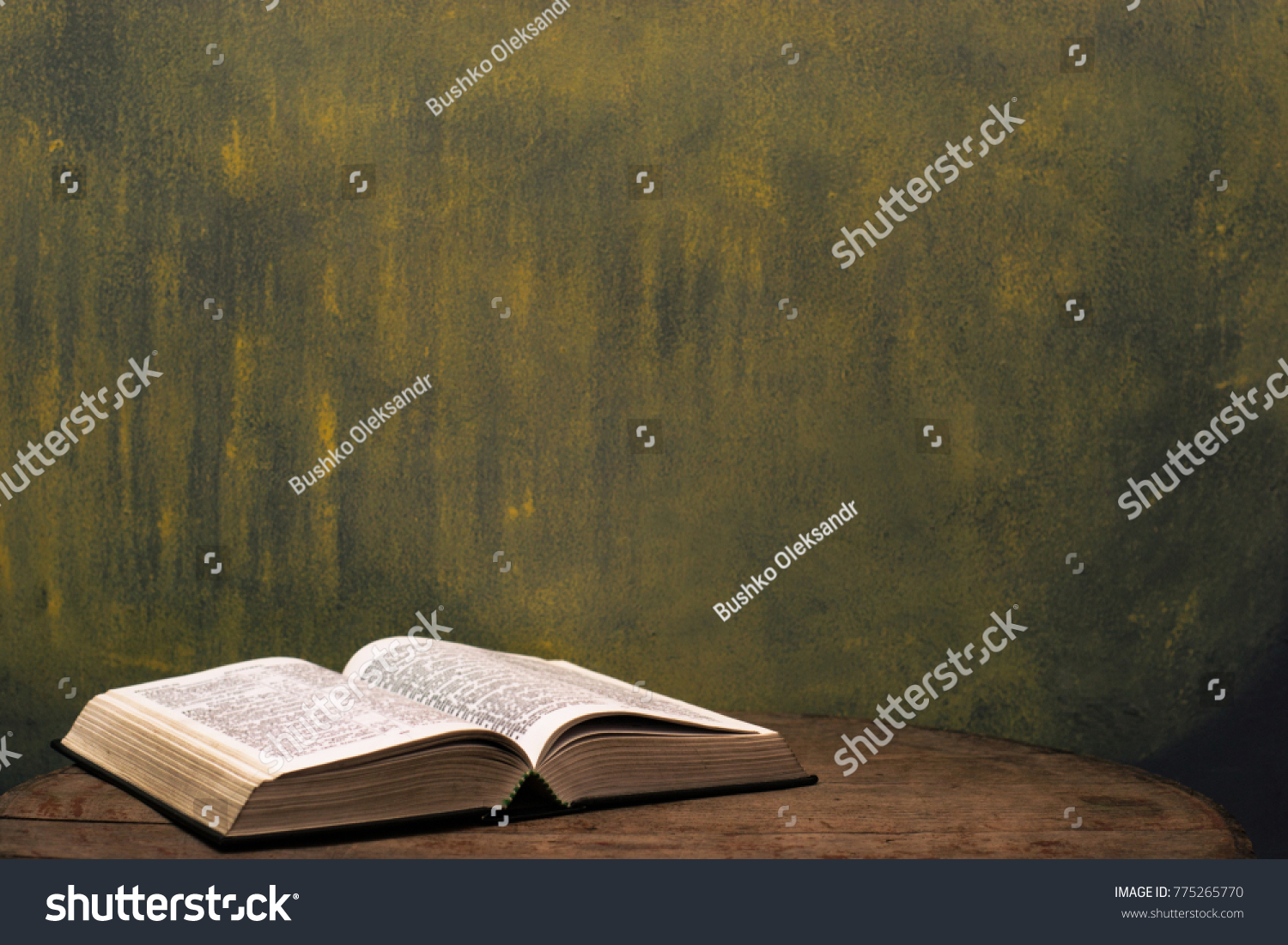 Bible On Old Round Wooden Table Stock Photo 775265770 