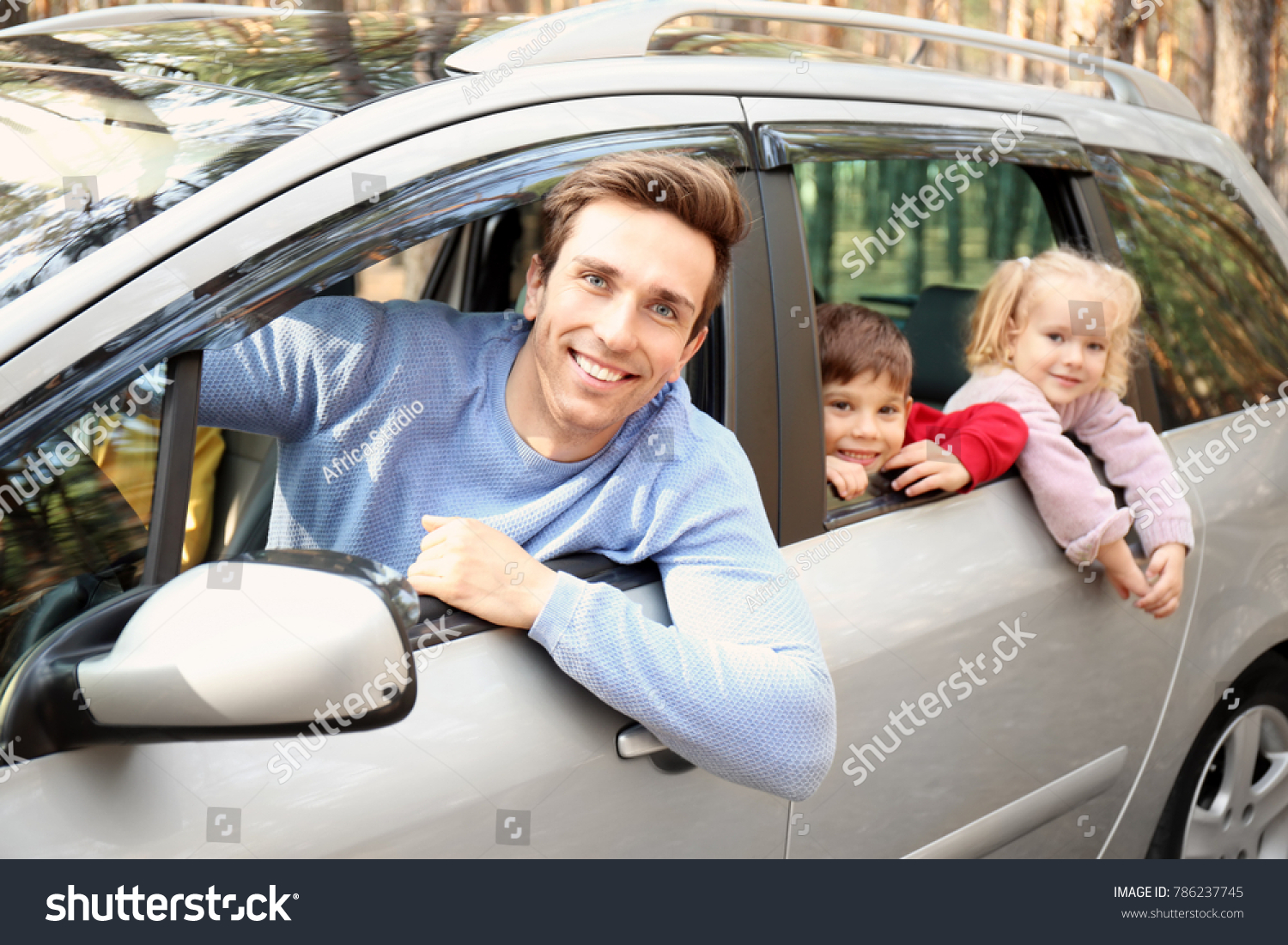 Leaning out of car