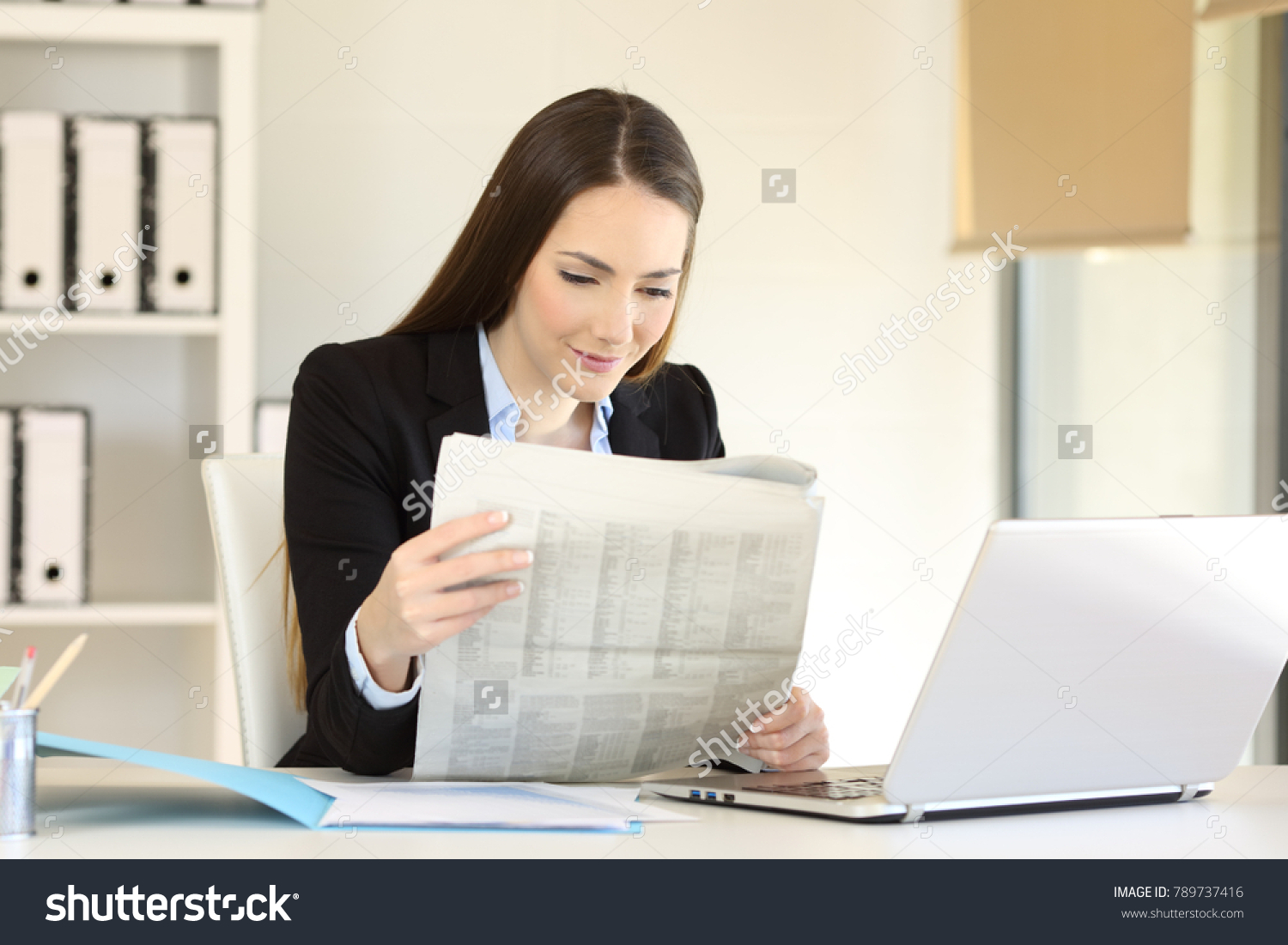 Portrait Happy Businesswoman Reading Newspaper Office Stock Photo ...