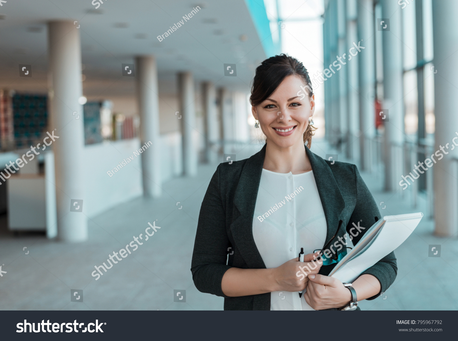 Businesswoman hold documents Ащдв photos