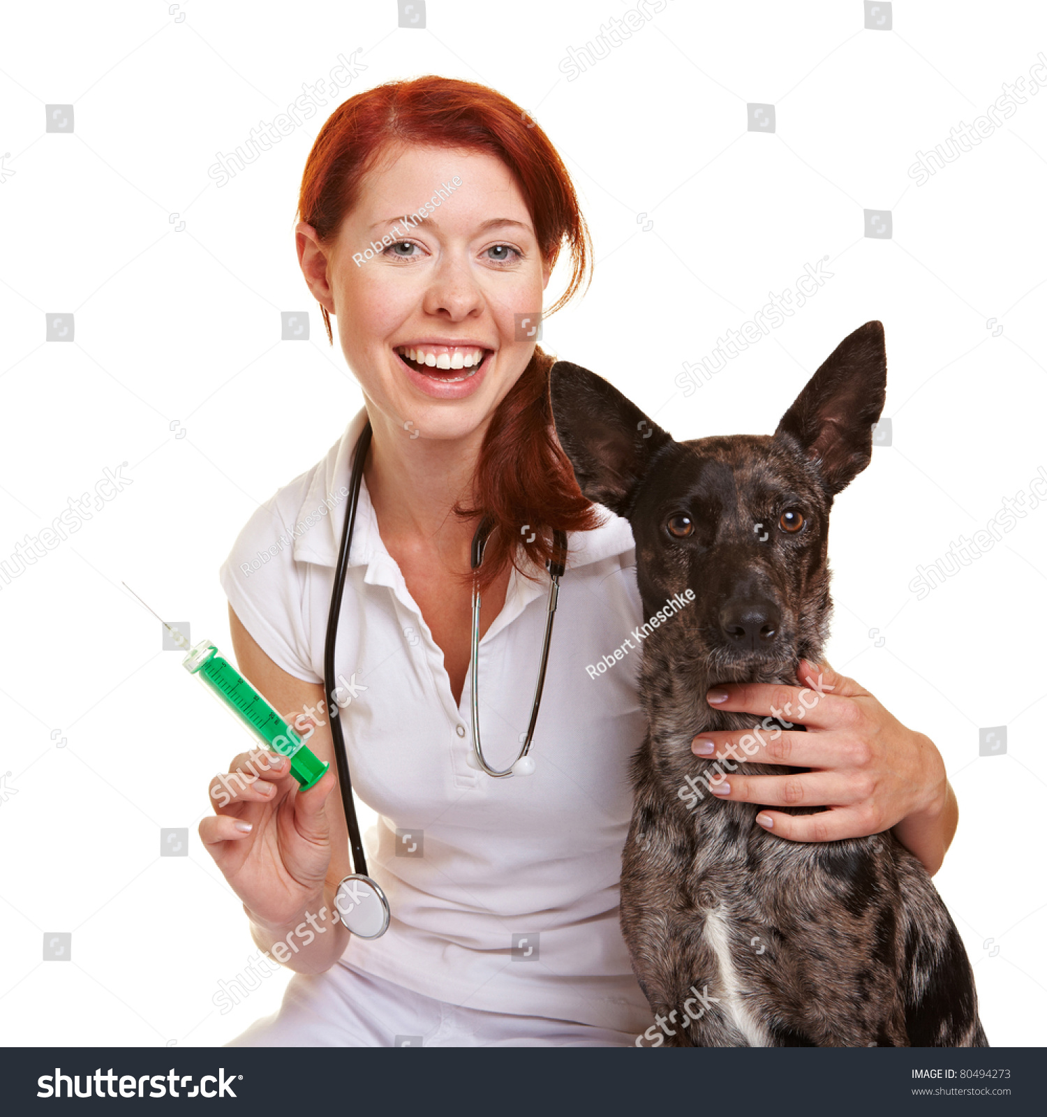 Fröhliche weibliche lächelnde Tierärztin mit Hund: Stockfoto (Jetzt bearbei...