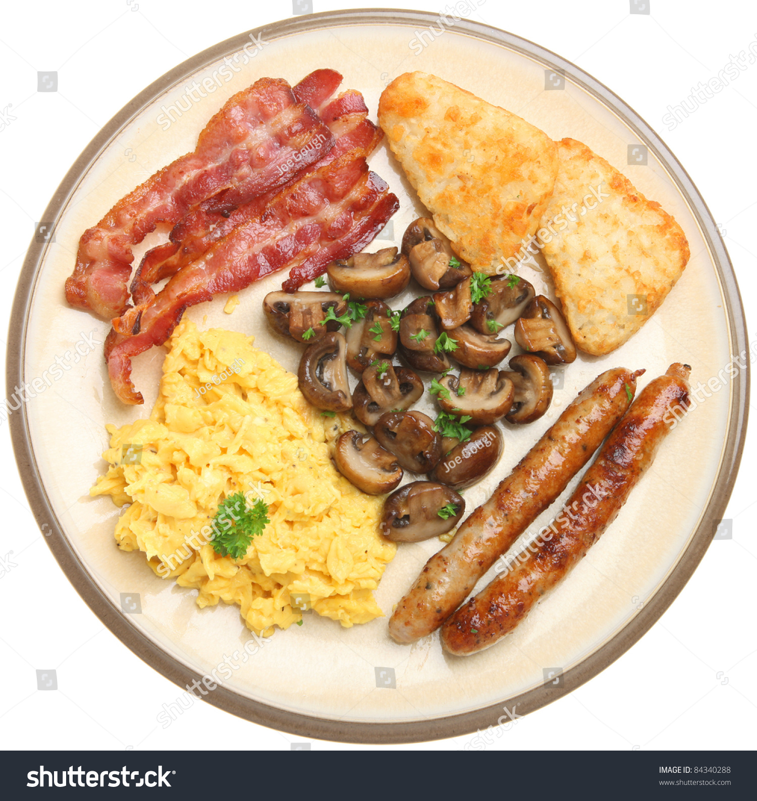 scrambled eggs and bacon and sausage