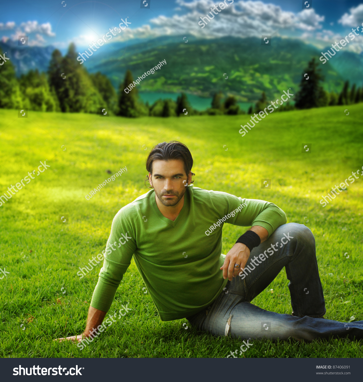 outdoor-portrait-good-looking-man-scenic-stock-photo-87406091