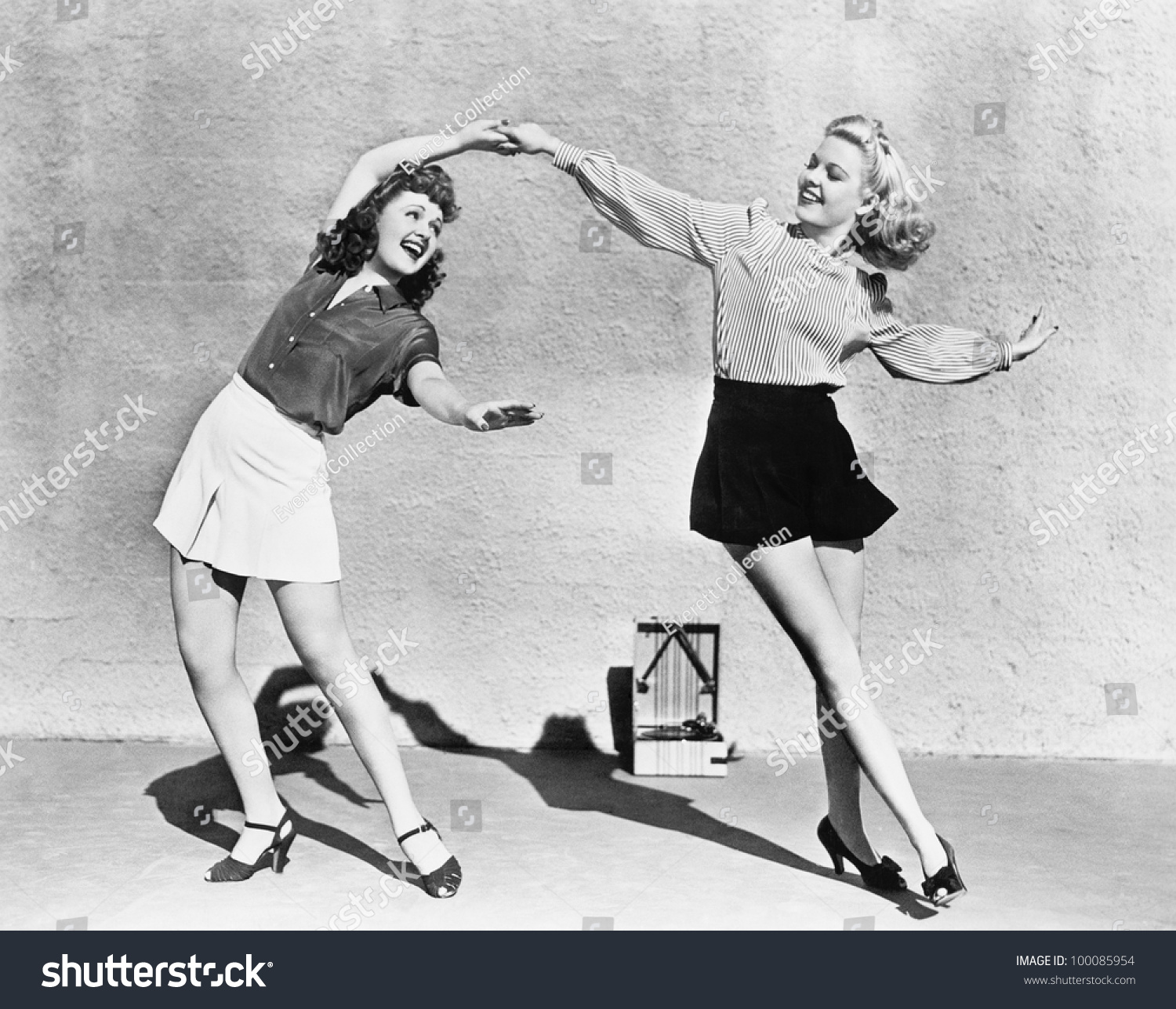 Two women dancing outside #100085954