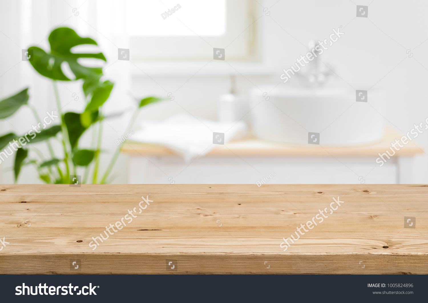 Empty tabletop for product display with blurred bathroom interior background #1005824896